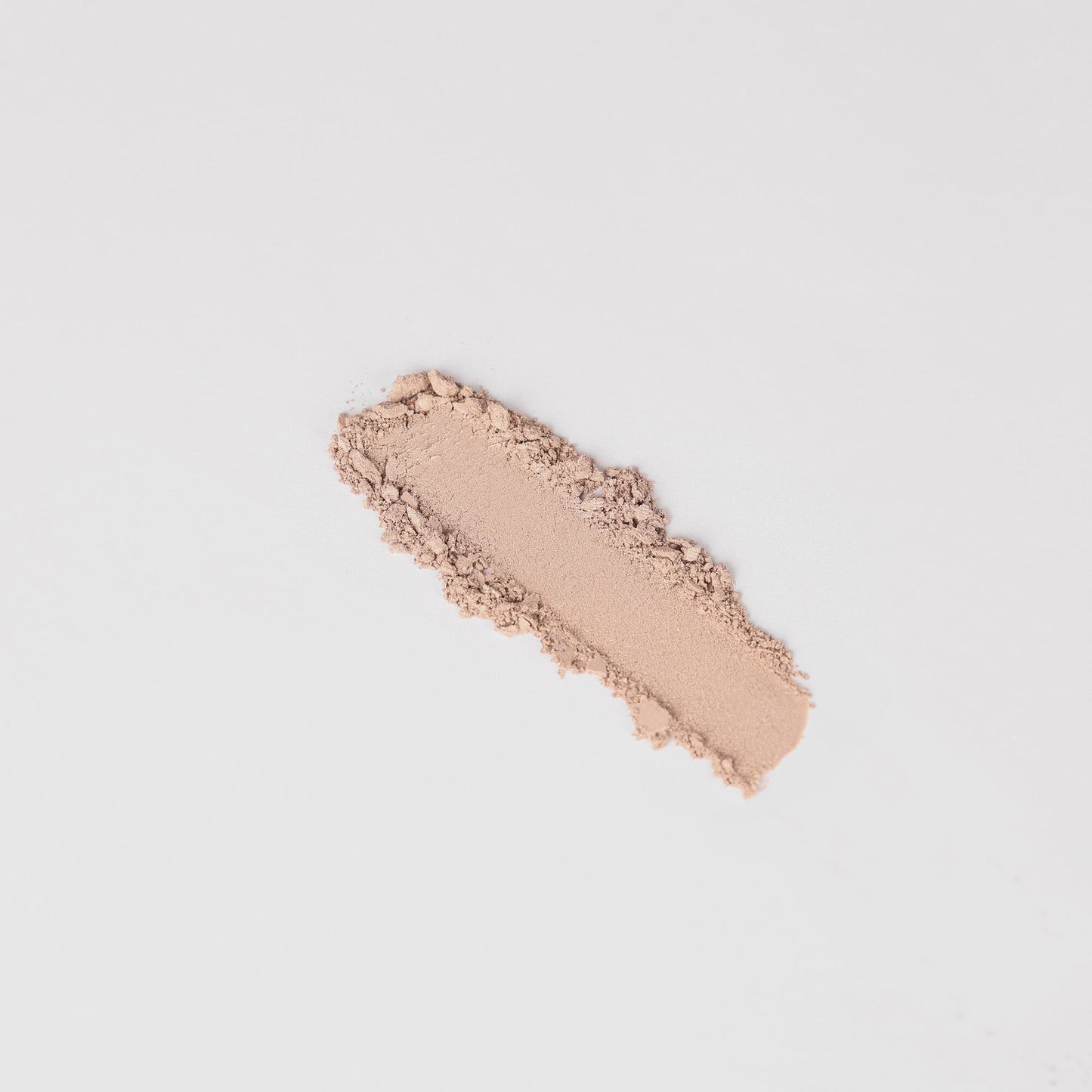 Swatch of Glow Pressed Eyeshadow showing smooth, luminous vegan pigment on a neutral background.