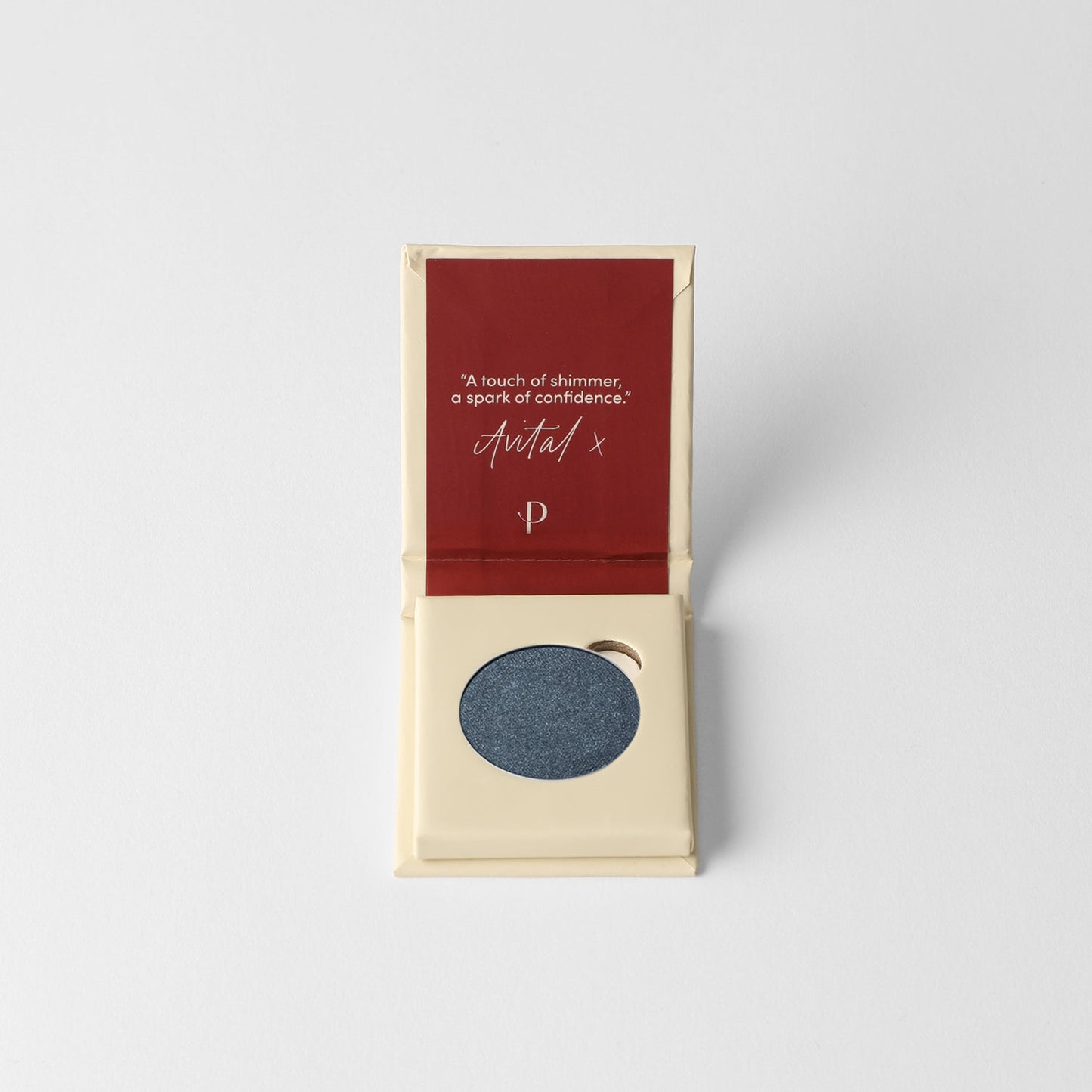 Glow Pressed Eyeshadow in compact open to reveal vegan pigment for easy application and multi-use makeup looks.