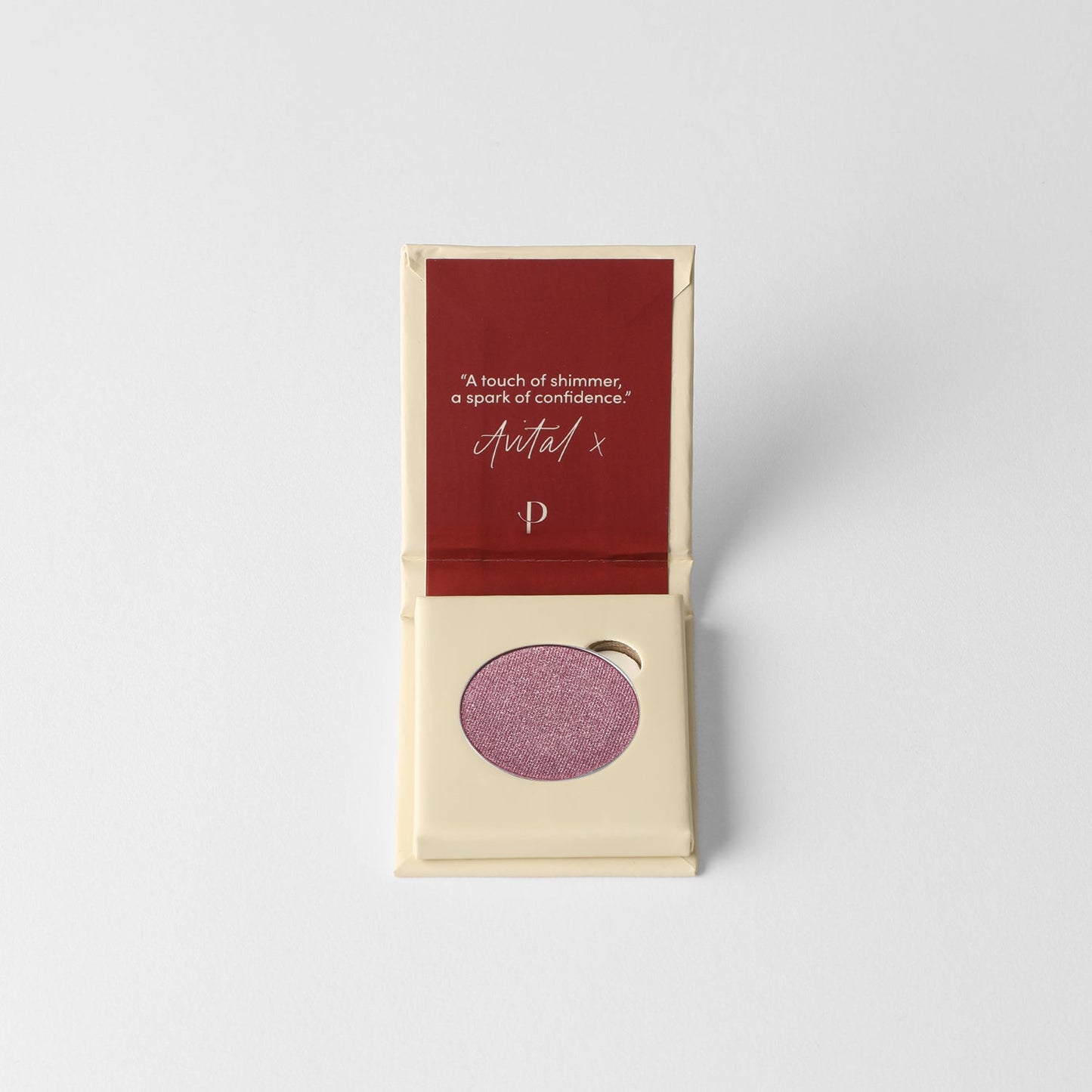 Glow Pressed Eyeshadow with rich vegan pigments for a luminous finish, showcased in an open compact against a white background.