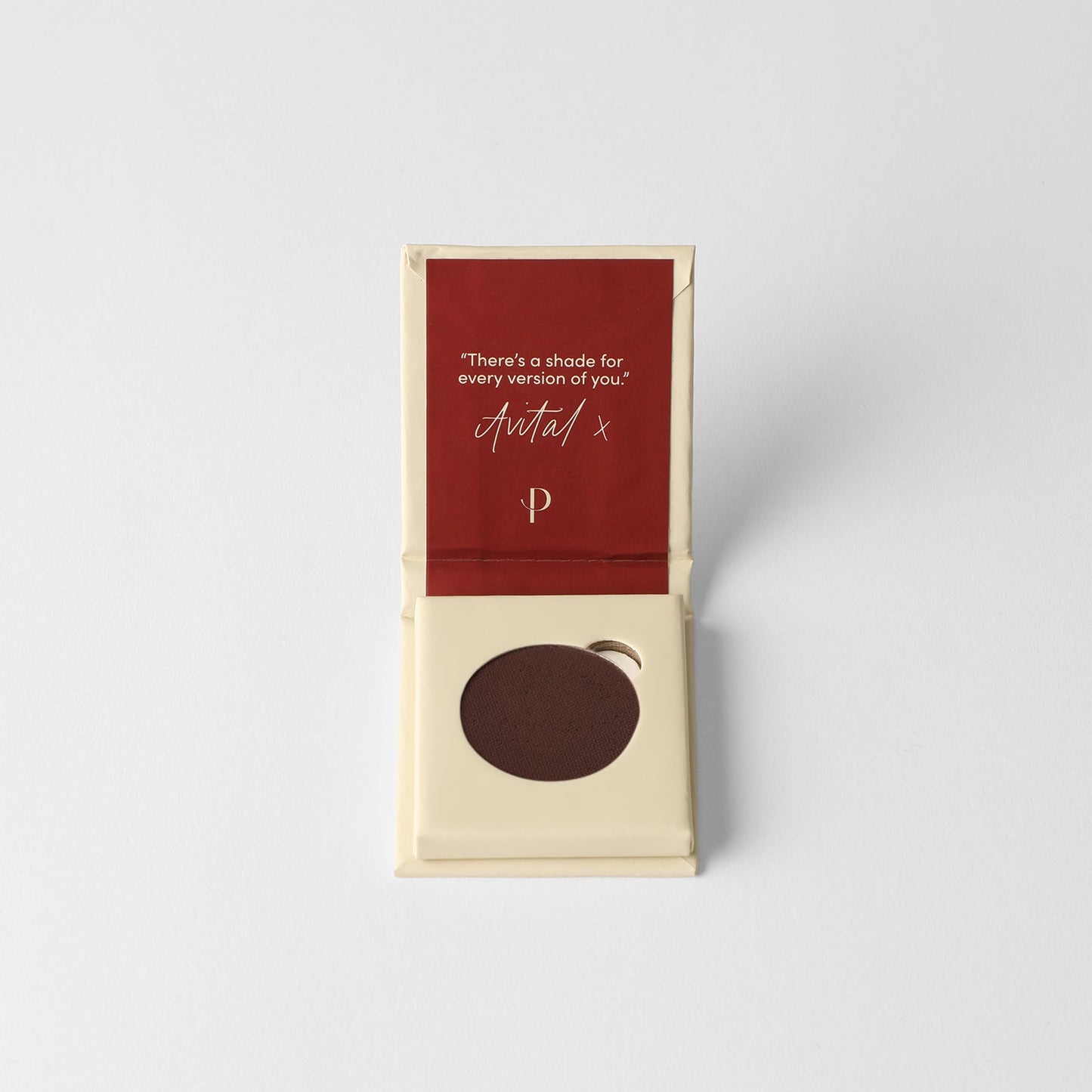 Matte Pressed Eyeshadow in rich vegan pigment, open packaging view showing smooth, blendable pan for seamless application and versatility.