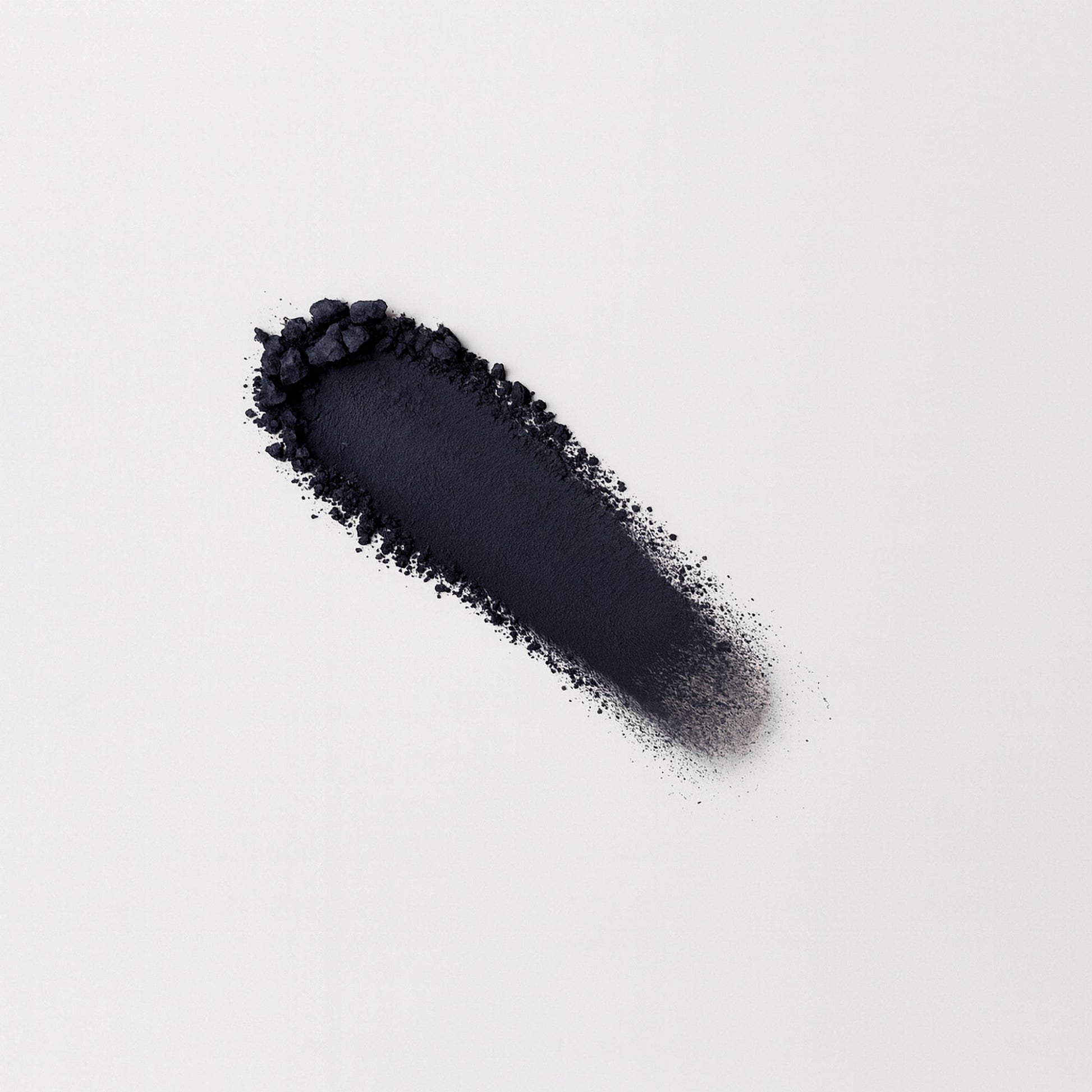 Matte Pressed Eyeshadow swatch on white background, showcasing smooth blendable vegan pigment.