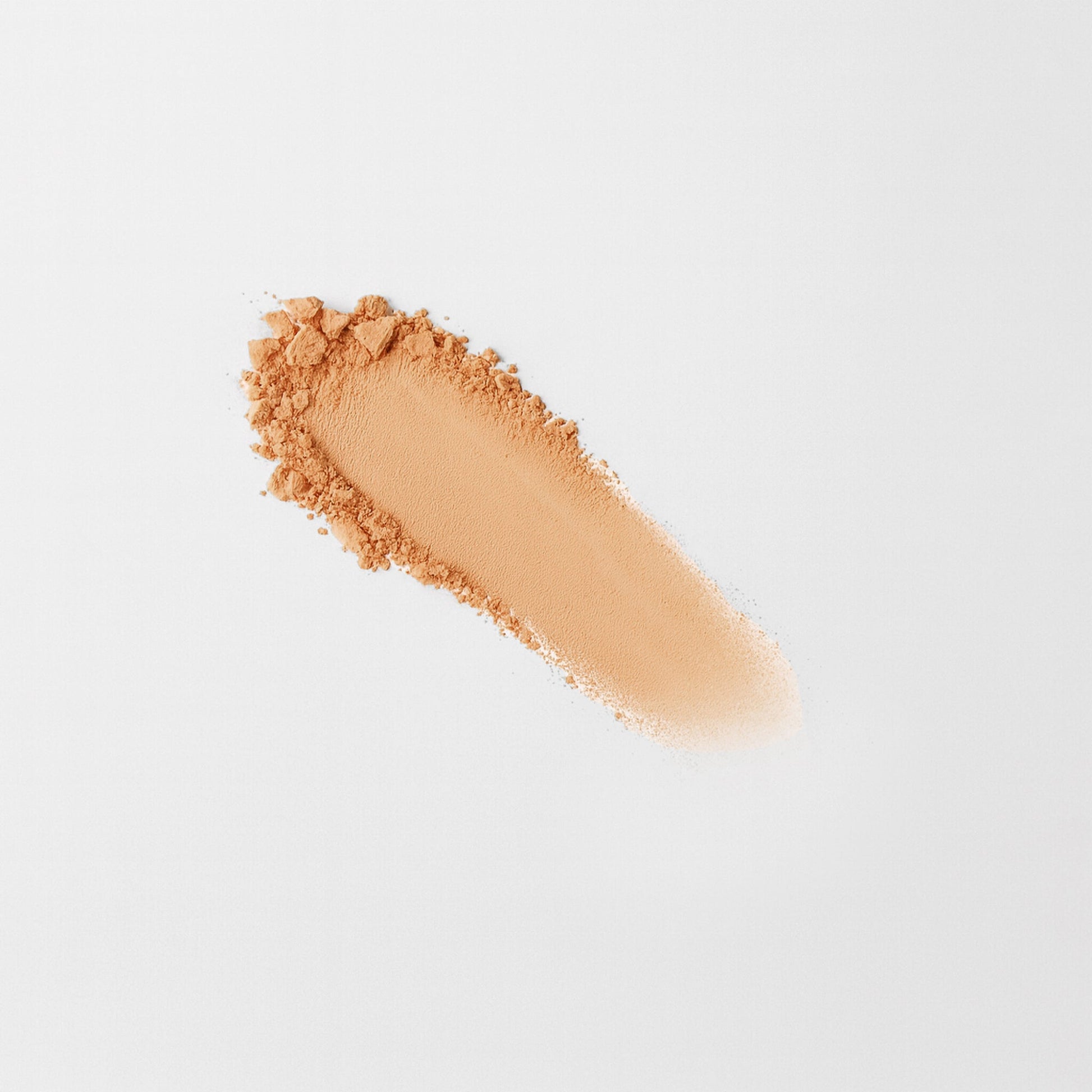 Smooth swipe of Matte Pressed Eyeshadow showcasing buildable vegan pigments against a white background.