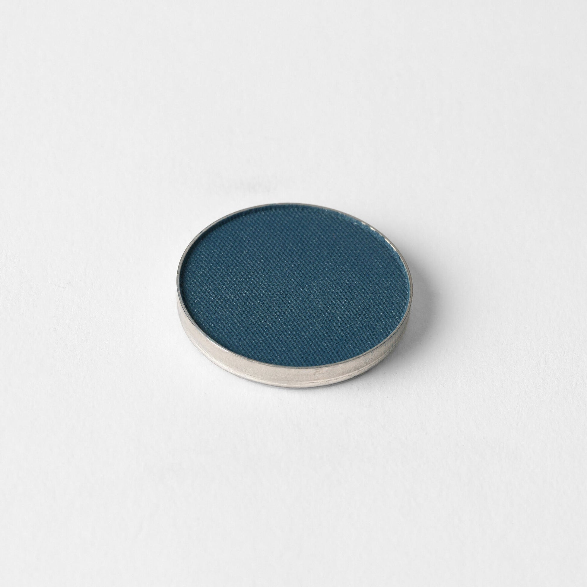 Matte Pressed Eyeshadow in a round pan, rich vegan pigments for smooth application, compatible with magnetic palettes.