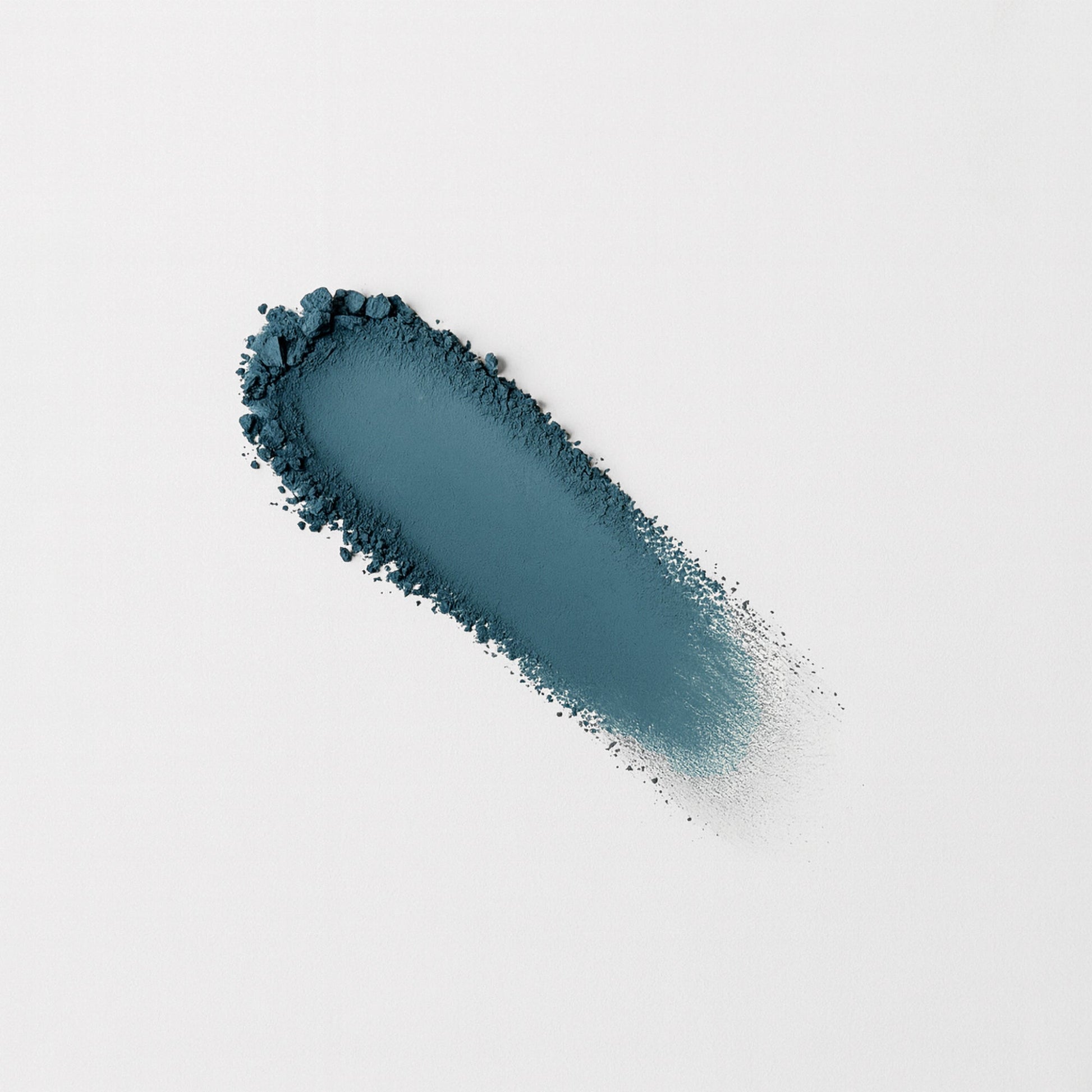 Matte Pressed Eyeshadow swatch demonstrating smooth, blendable vegan pigment in a rich blue shade for versatile looks.