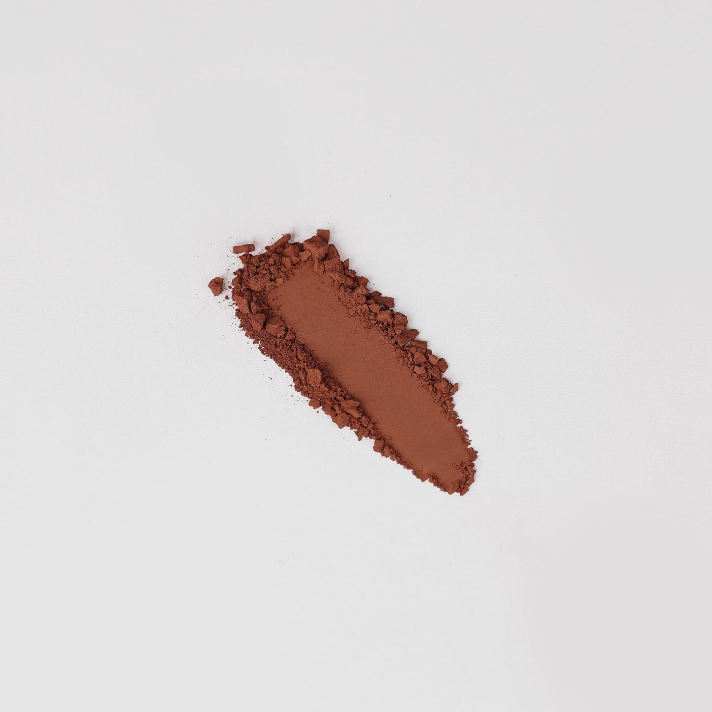 Matte Pressed Eyeshadow swatch showcasing its smooth, blendable texture and rich vegan pigment on a white background.