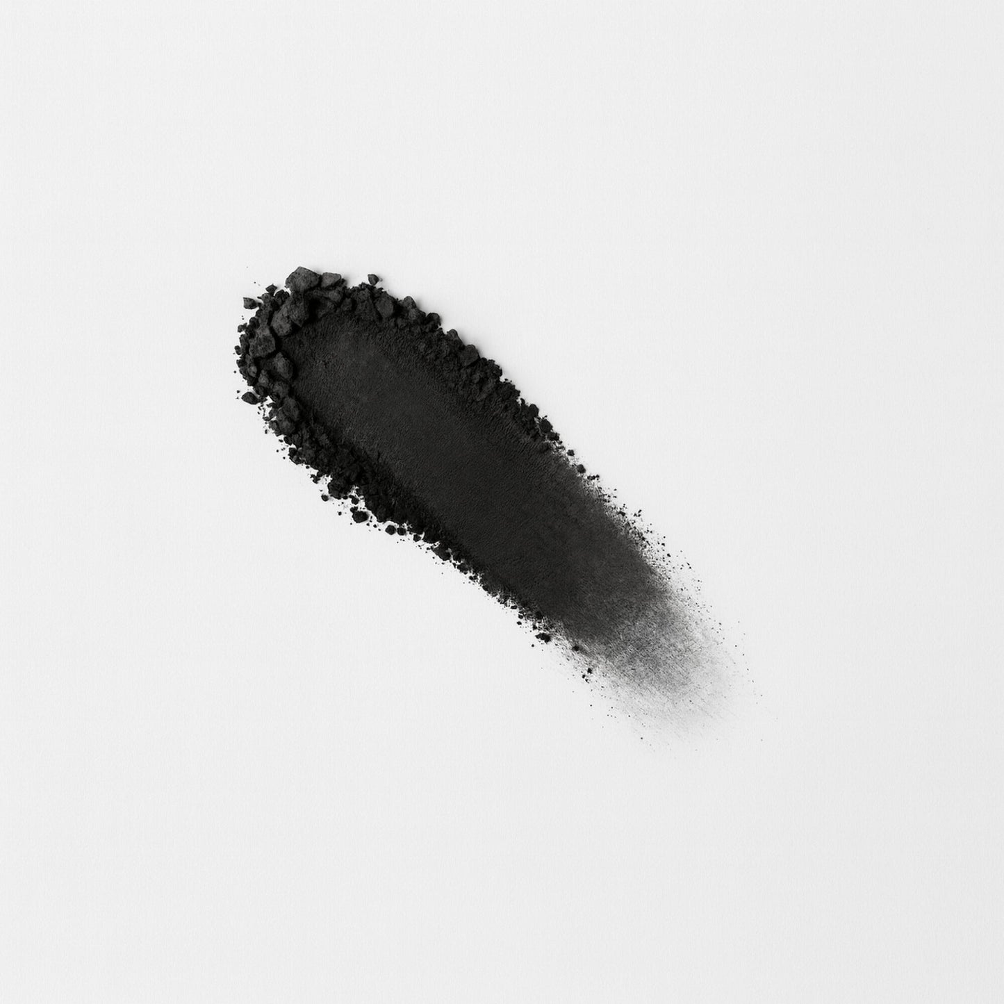 Matte Pressed Eyeshadow in black pigment smudge on white background