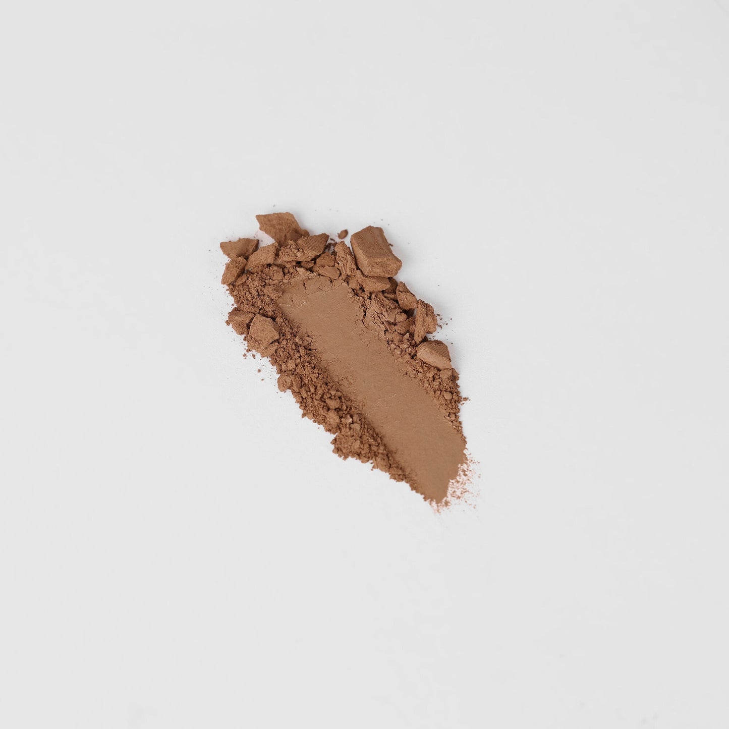 Face Powder swatch showcasing lightweight, vegan formula for long-lasting coverage. Perfect for all day wear and layering.