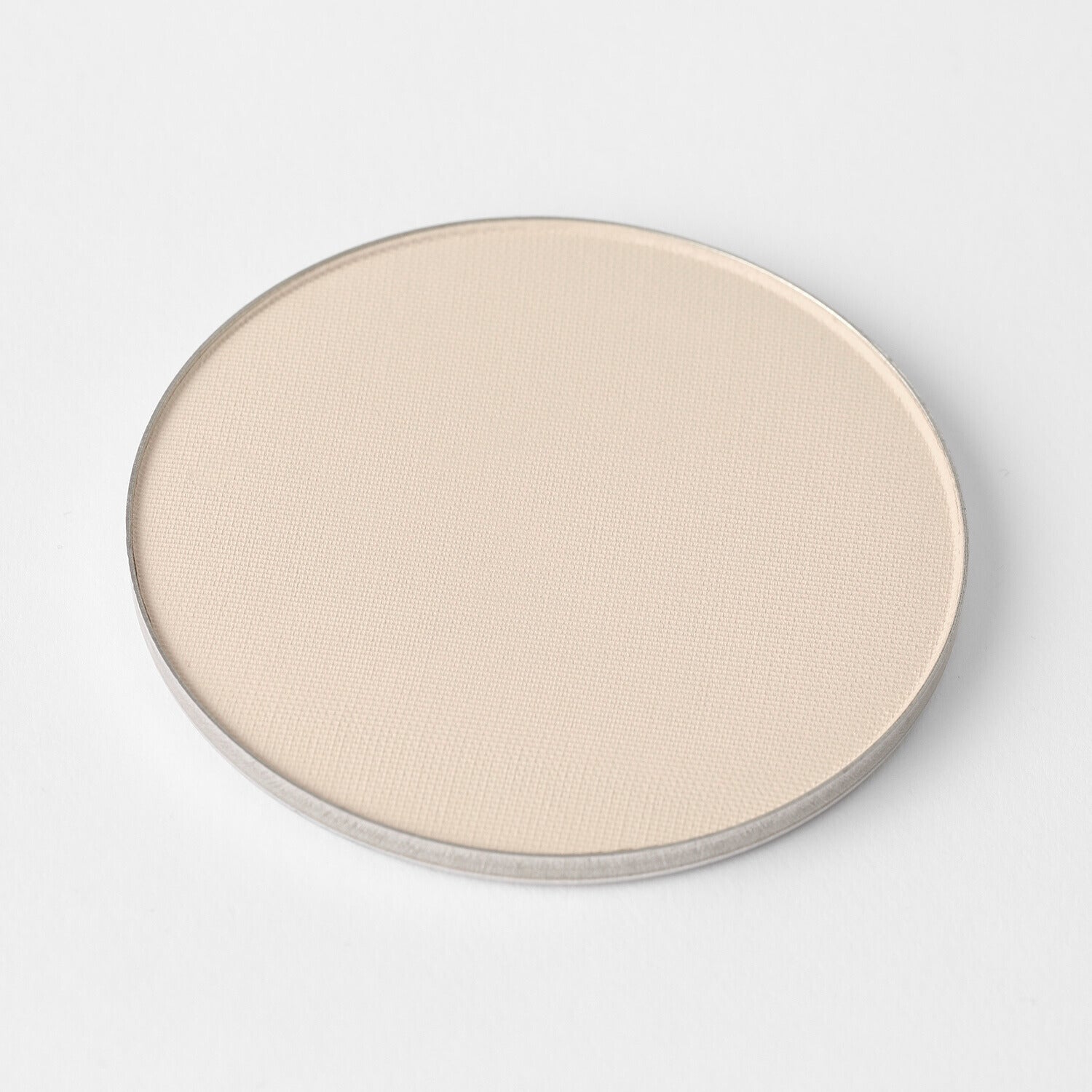 Lightweight vegan Face Powder in a circular pan, perfect for long-lasting coverage and seamless use with magnetic palettes.