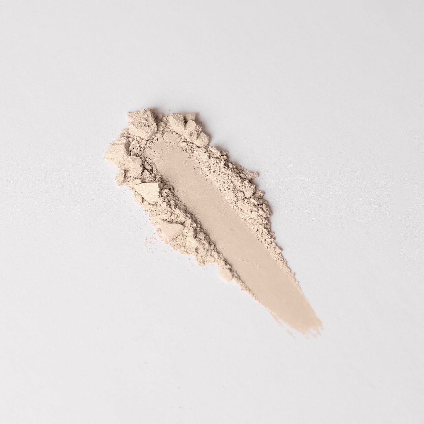 Face Powder swatch showcasing the texture of lightweight, vegan pressed powder for seamless, long-lasting coverage.