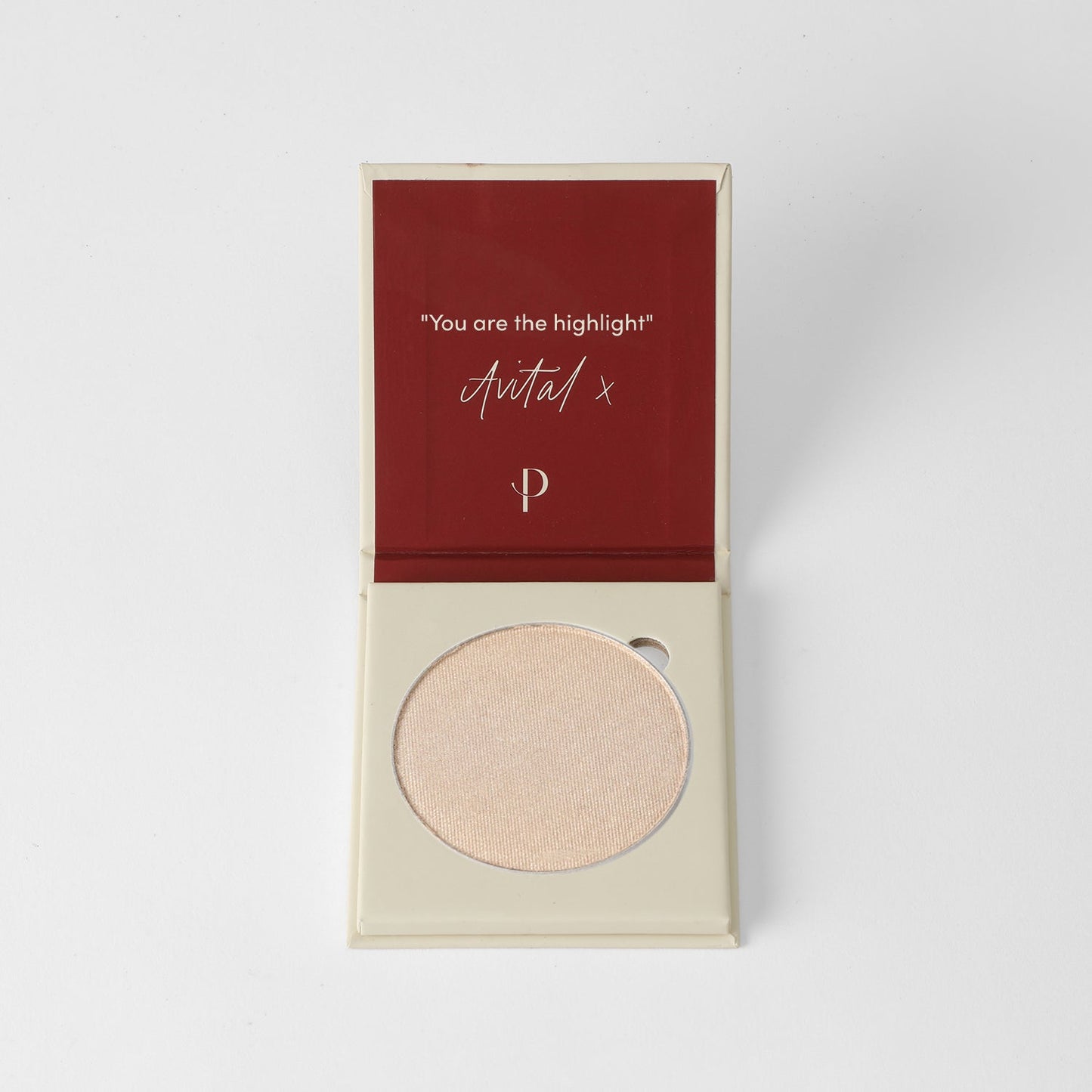 Open compact of vegan Highlighter with silky smooth powder in glow finish, fits in Magnetic Palette, enhancing makeup radiance.