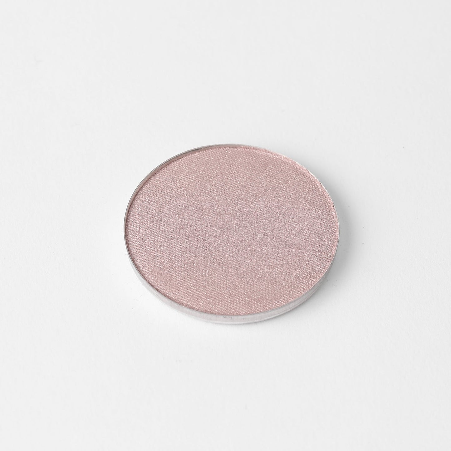 Highlighter in a round pan for glowing or matte finish, fits in Large or Small Magnetic Palette, vegan and buildable formula.