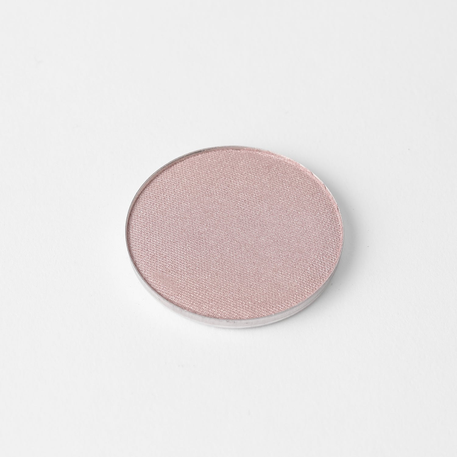 Highlighter in a round pan for glowing or matte finish, fits in Large or Small Magnetic Palette, vegan and buildable formula.