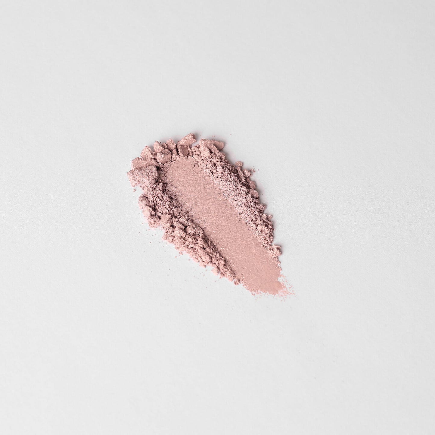 Highlighter in silky smooth pink matte finish, perfect for a radiant shine, vegan and buildable for customizable glow.