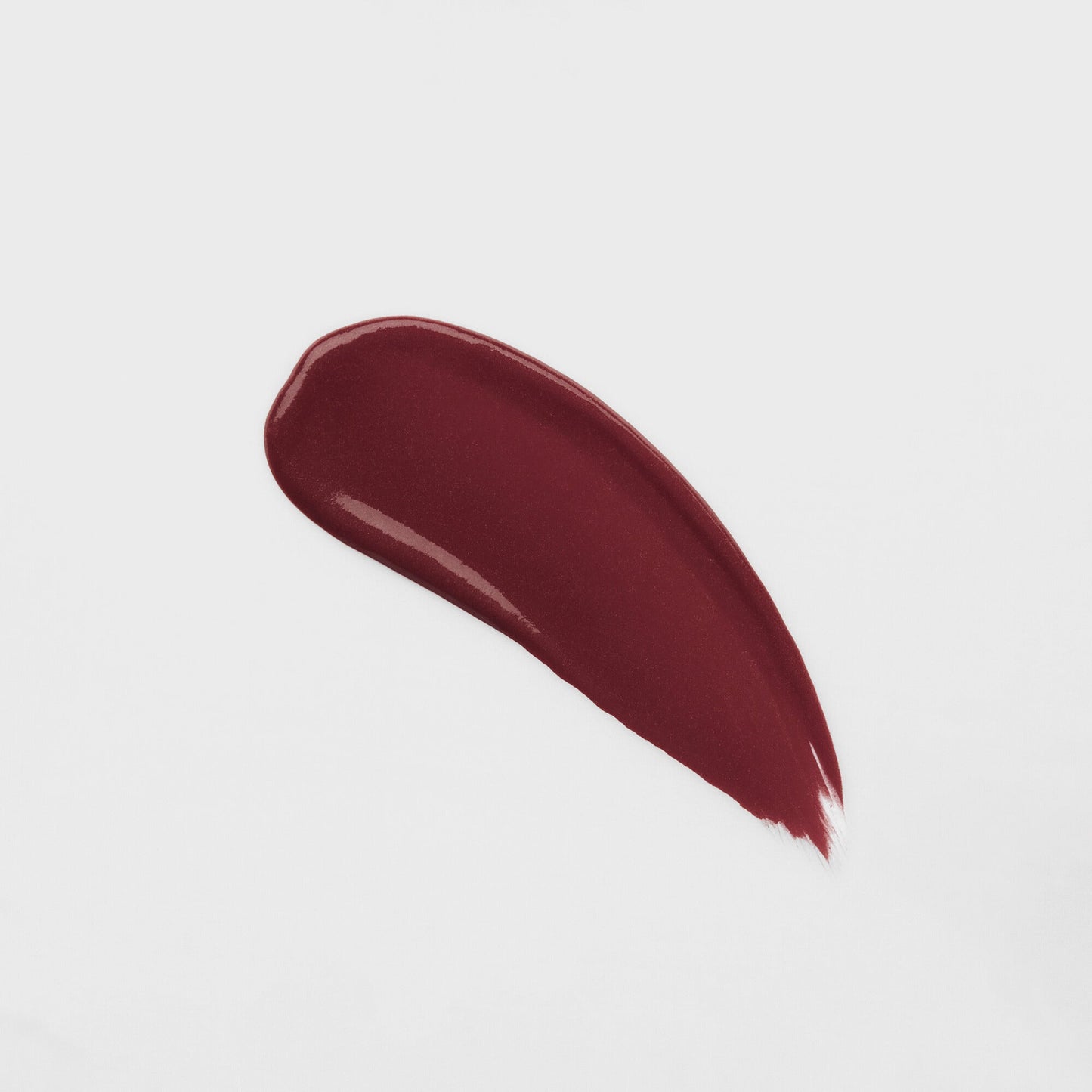 Lip Gloss Wand swatch showcasing deep, glossy color for a high-shine, nourishing finish.