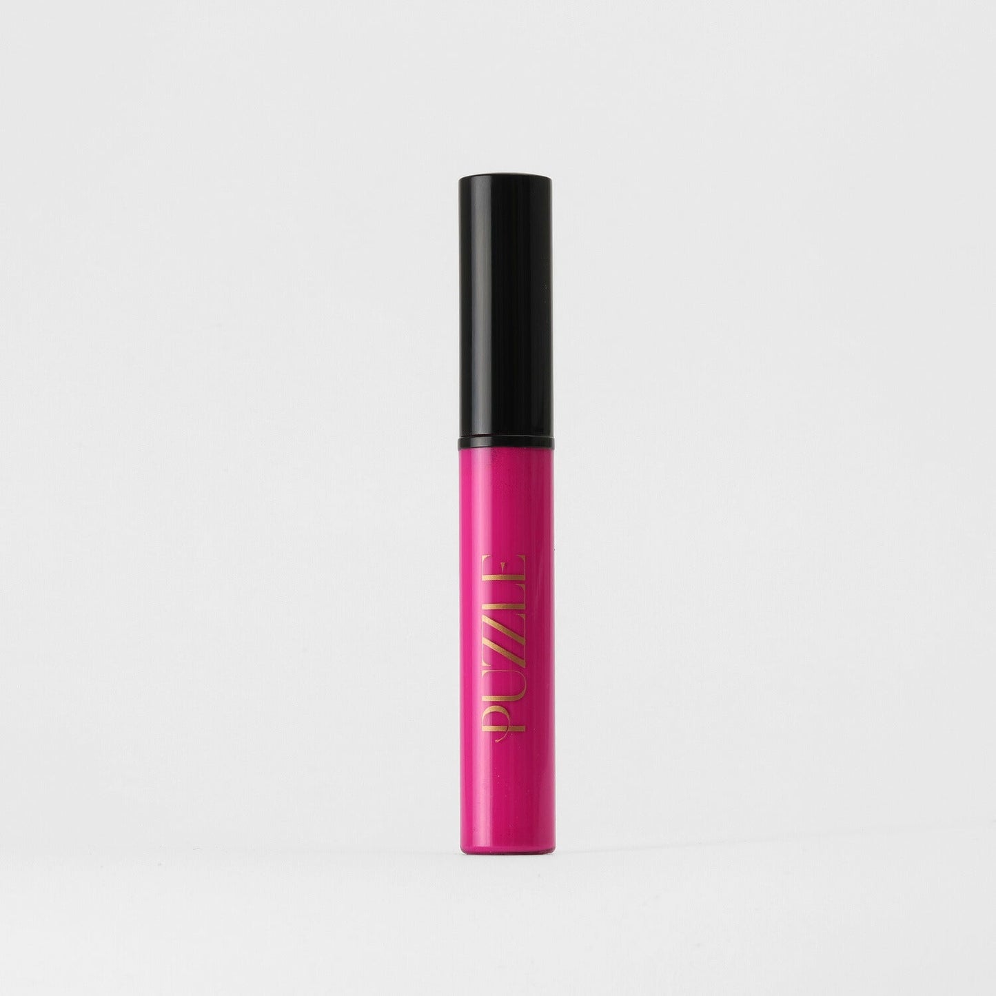 Lip Gloss Wand in vibrant pink, offering a soft-touch, high-shine finish, perfect for a dimensional glow and nourishing smoothness.