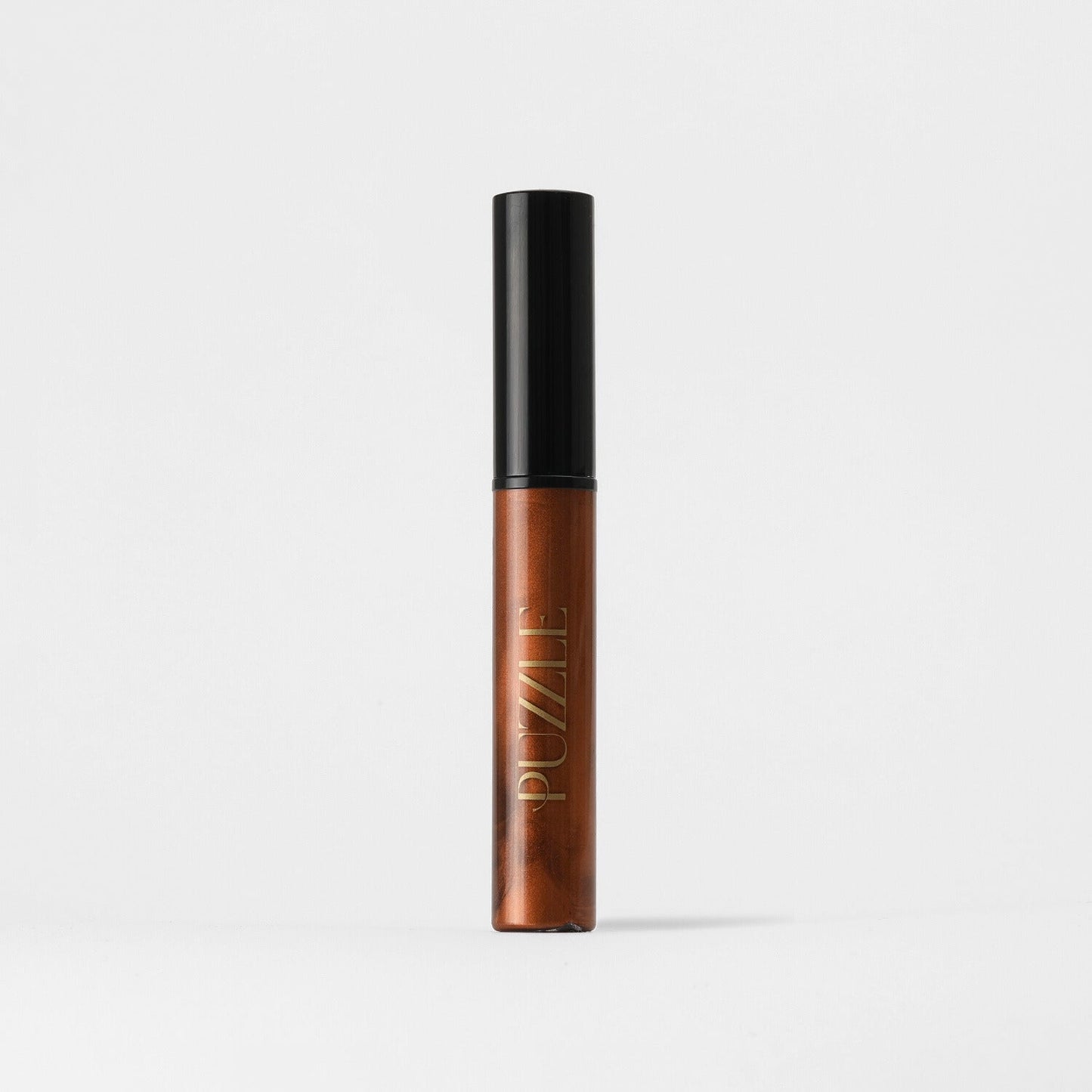 Lip Gloss Wand in a sleek tube, vegan glossy finish, nourishing non-sticky formula, ideal for high-shine dimensional glow on lips.