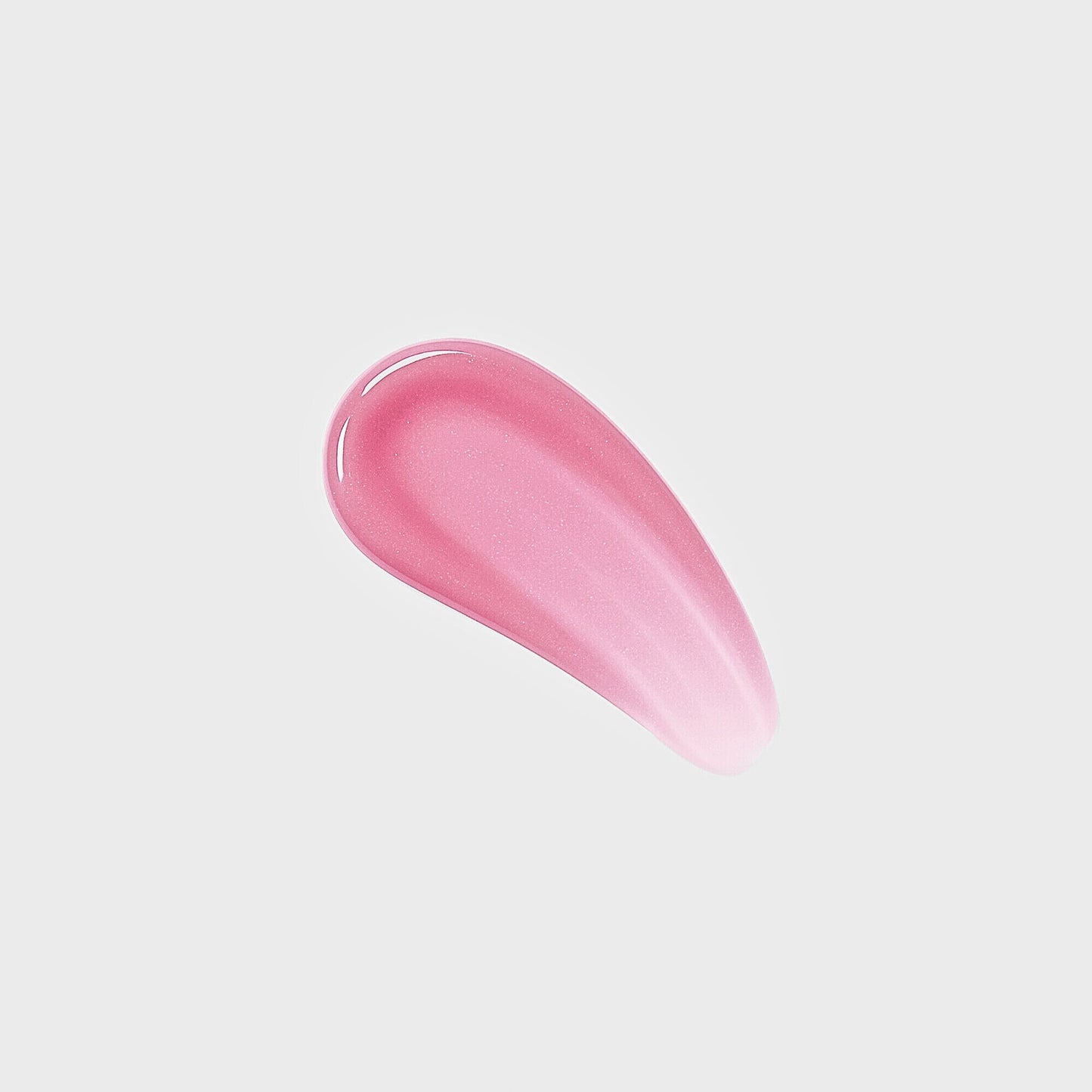 Pink Lip Gloss Wand swatch with high-shine finish, showcasing vegan, nourishing formula for hydrated lips. Use alone or layer over lipstick.