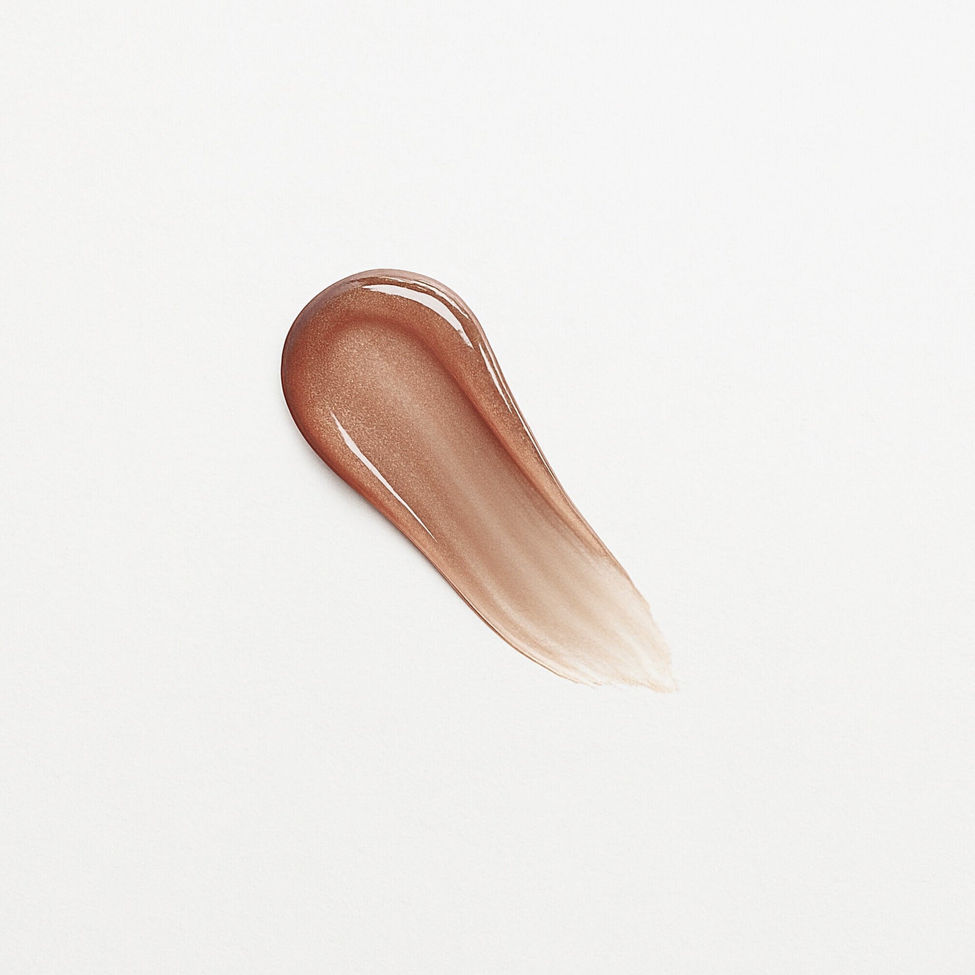 Lip Gloss Wand swatch showing high-shine and dimensional glow, perfect for nourishing and smooth lips. Vegan and non-sticky formula.
