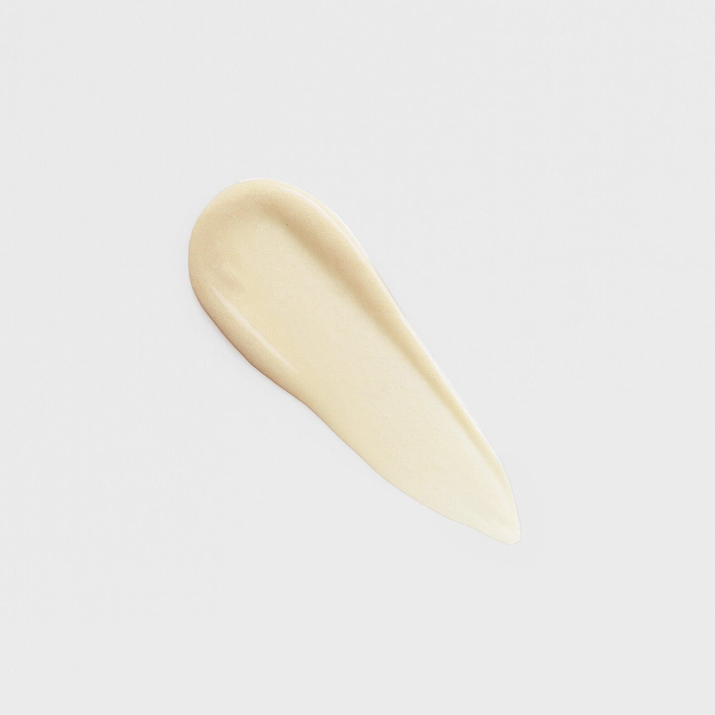 Creamy texture close-up of Lip Gloss Wand showing soft-touch high-shine formula