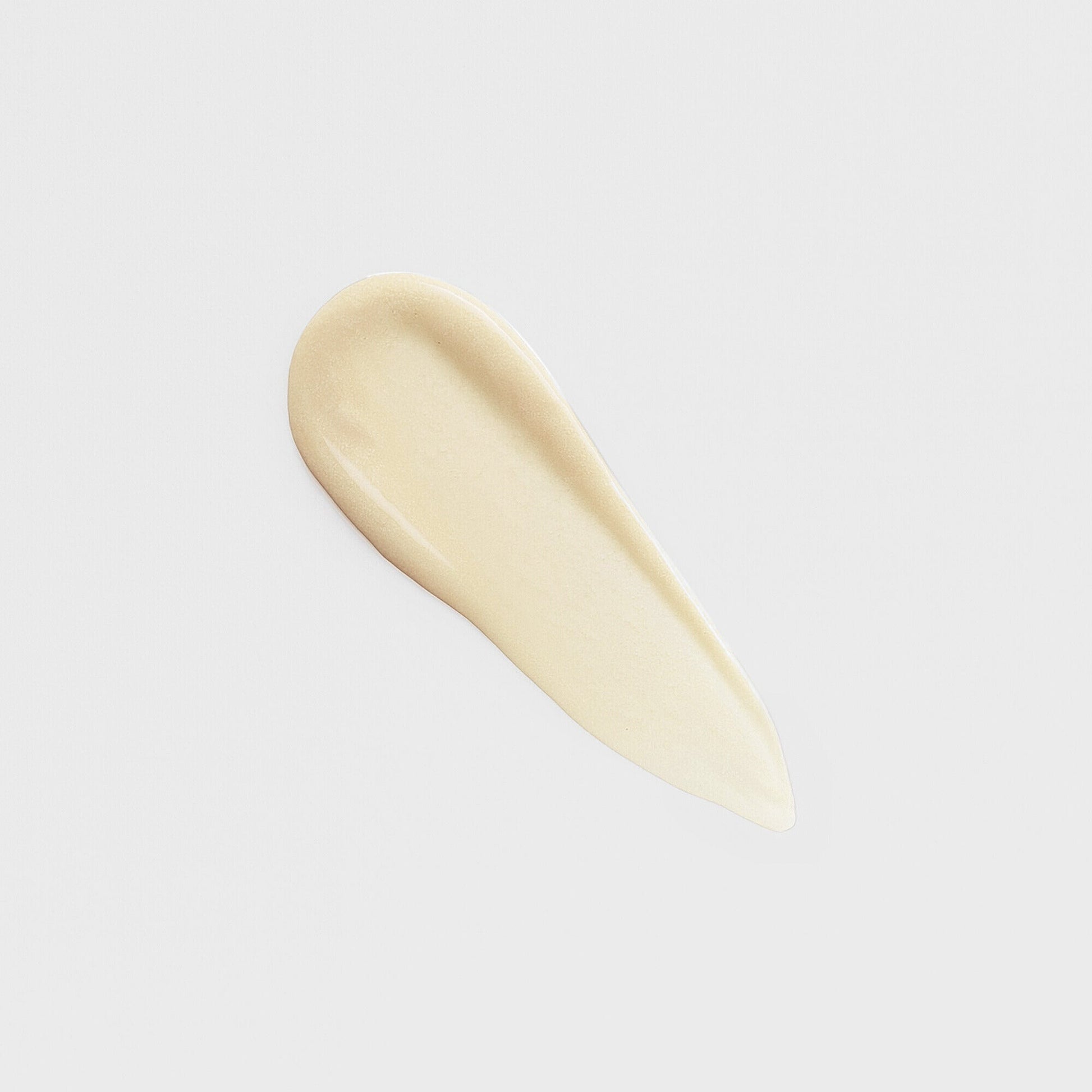 Creamy texture close-up of Lip Gloss Wand showing soft-touch high-shine formula