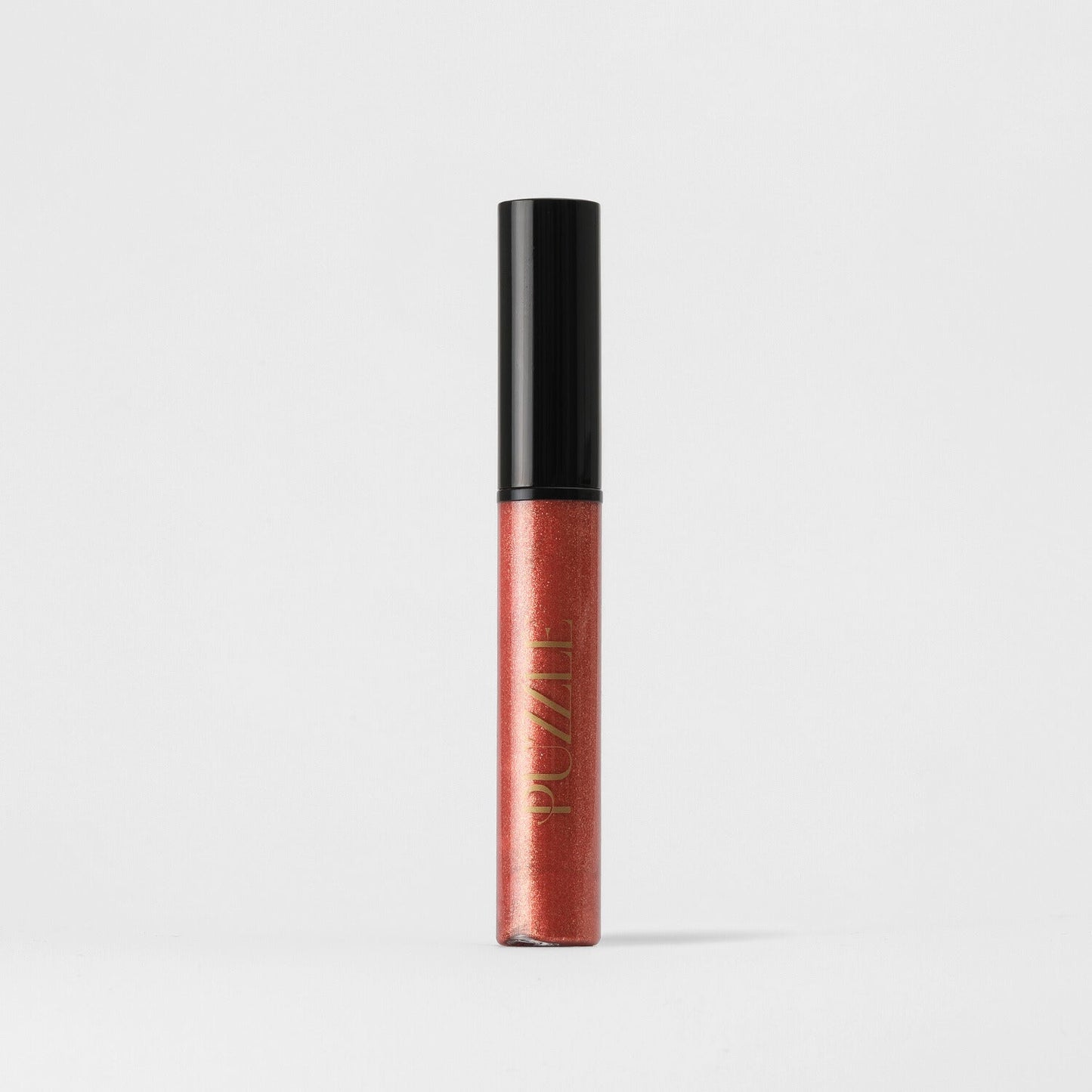 Lip Gloss Wand in a sleek tube, offering high-shine, non-sticky vegan gloss for smooth, nourished lips. Ideal alone or over lipstick.
