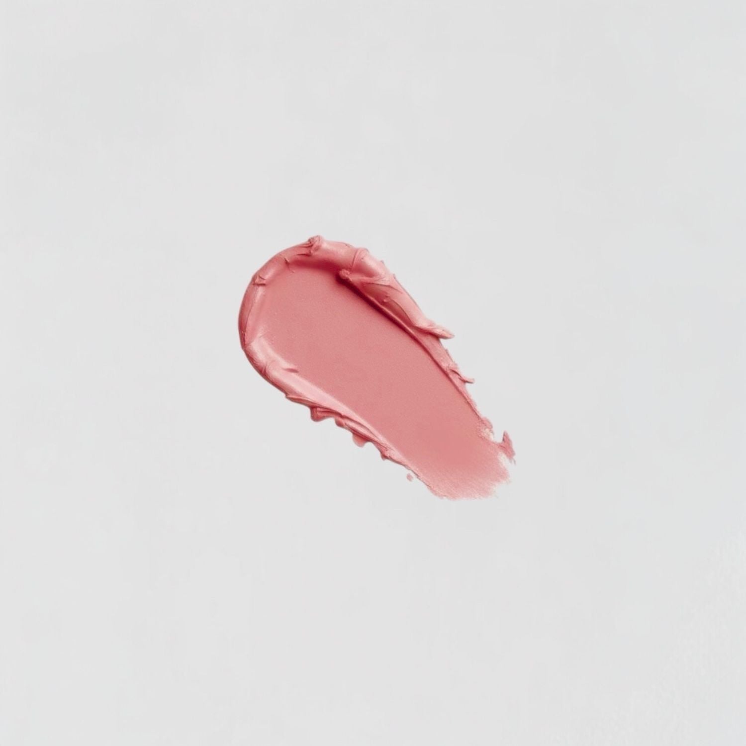 Lip Stain swatch in a soft pink shade, showcasing its velvety matte texture and long-lasting formula.