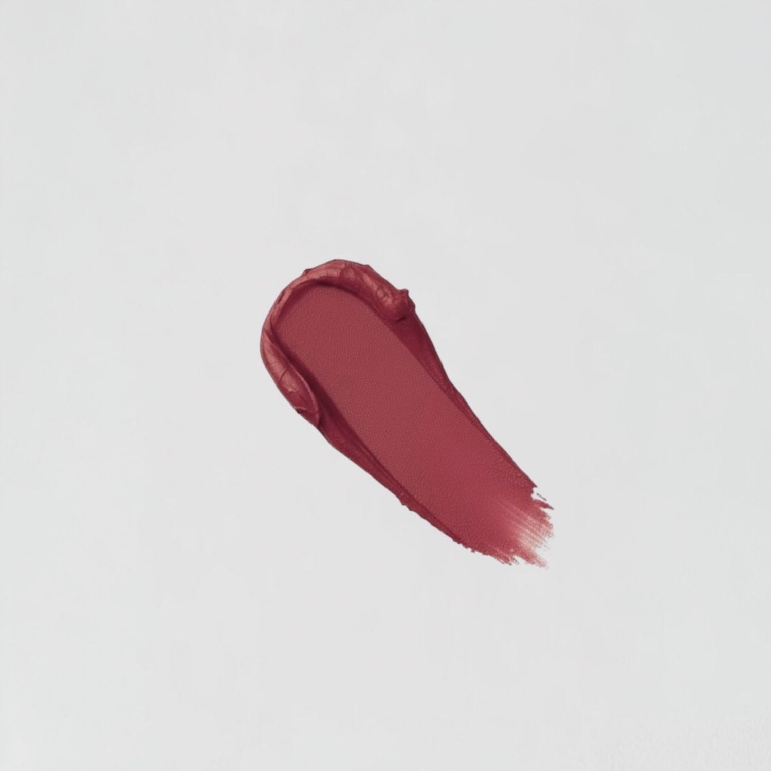 Smudge of vegan Lip Stain showcasing its rich, velvety texture and matte finish.