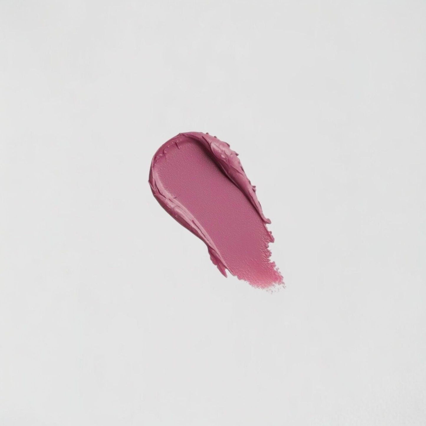 Lip Stain swatch showing velvety-soft, matte finish in a vibrant mauve shade. Vegan formula with long-lasting wear and skin benefits.