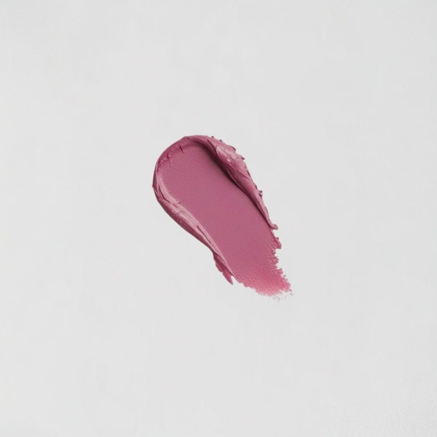 Lip Stain swatch showing velvety-soft, matte finish in a vibrant mauve shade. Vegan formula with long-lasting wear and skin benefits.