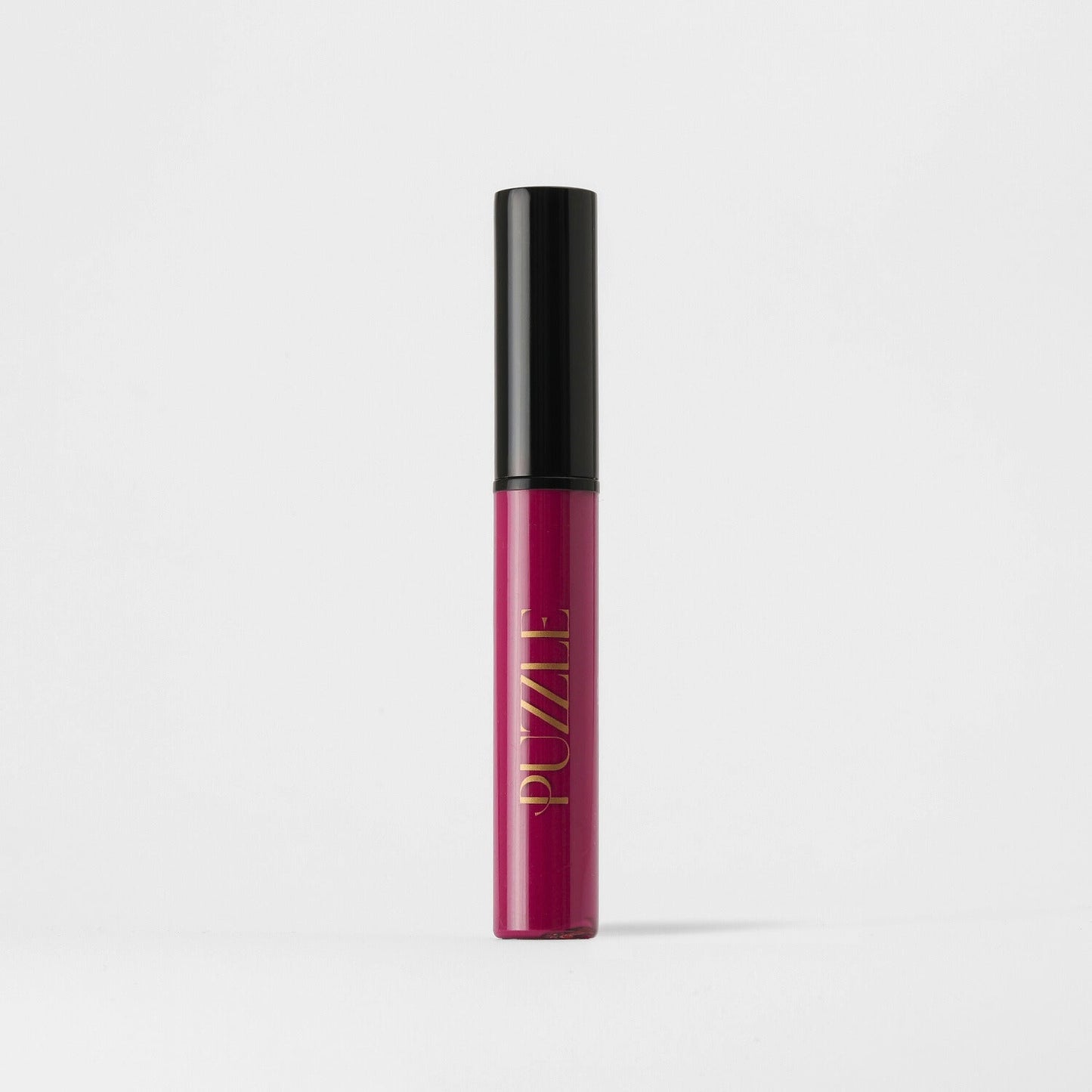 Lip Stain in pink packaging offering velvety-soft, long-lasting matte coverage. Vegan formula with skin benefits.