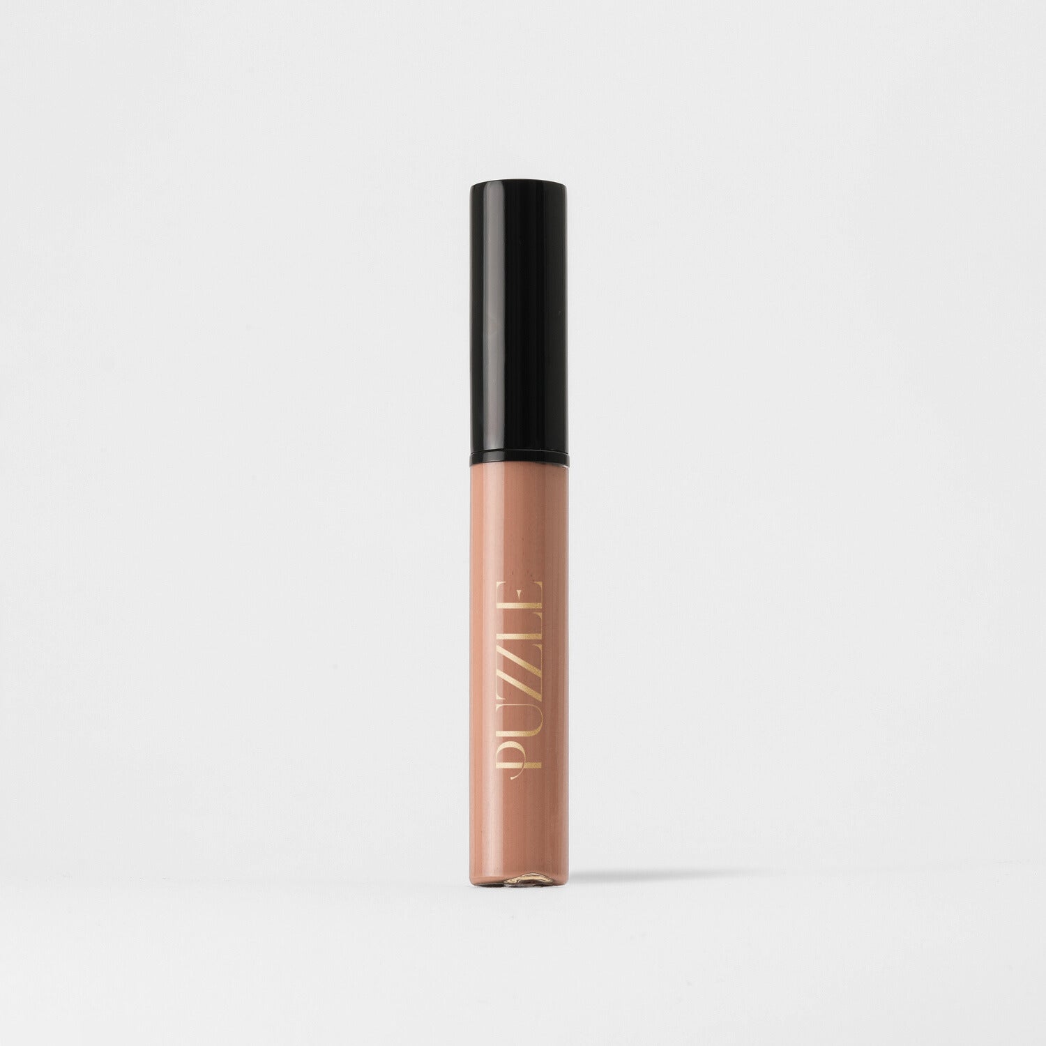 Lip Stain in nude shade with black cap, vegan and velvety-soft for matte finish, long-lasting and hydrating with skin benefits.