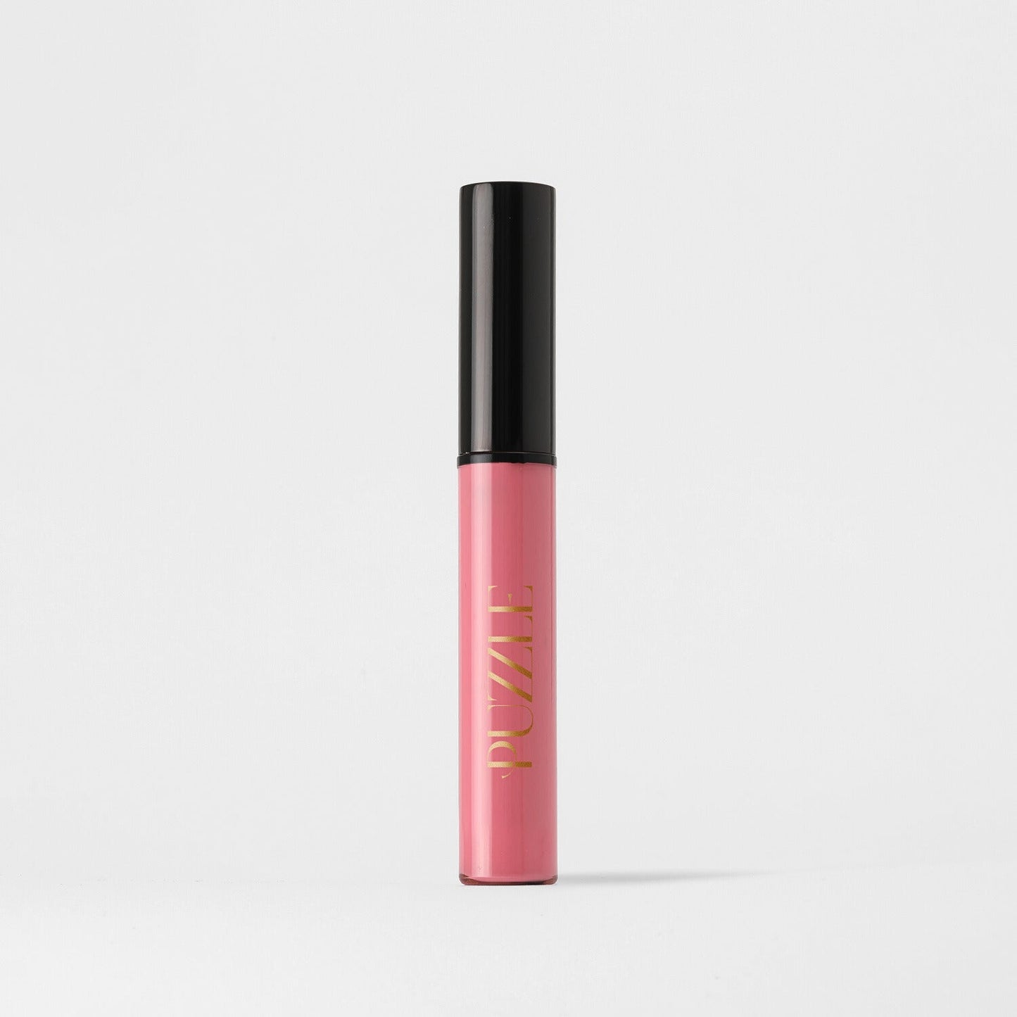 Lip Stain - Vegan, velvety-soft lip stain with matte finish and skin benefits in a sleek pink tube.