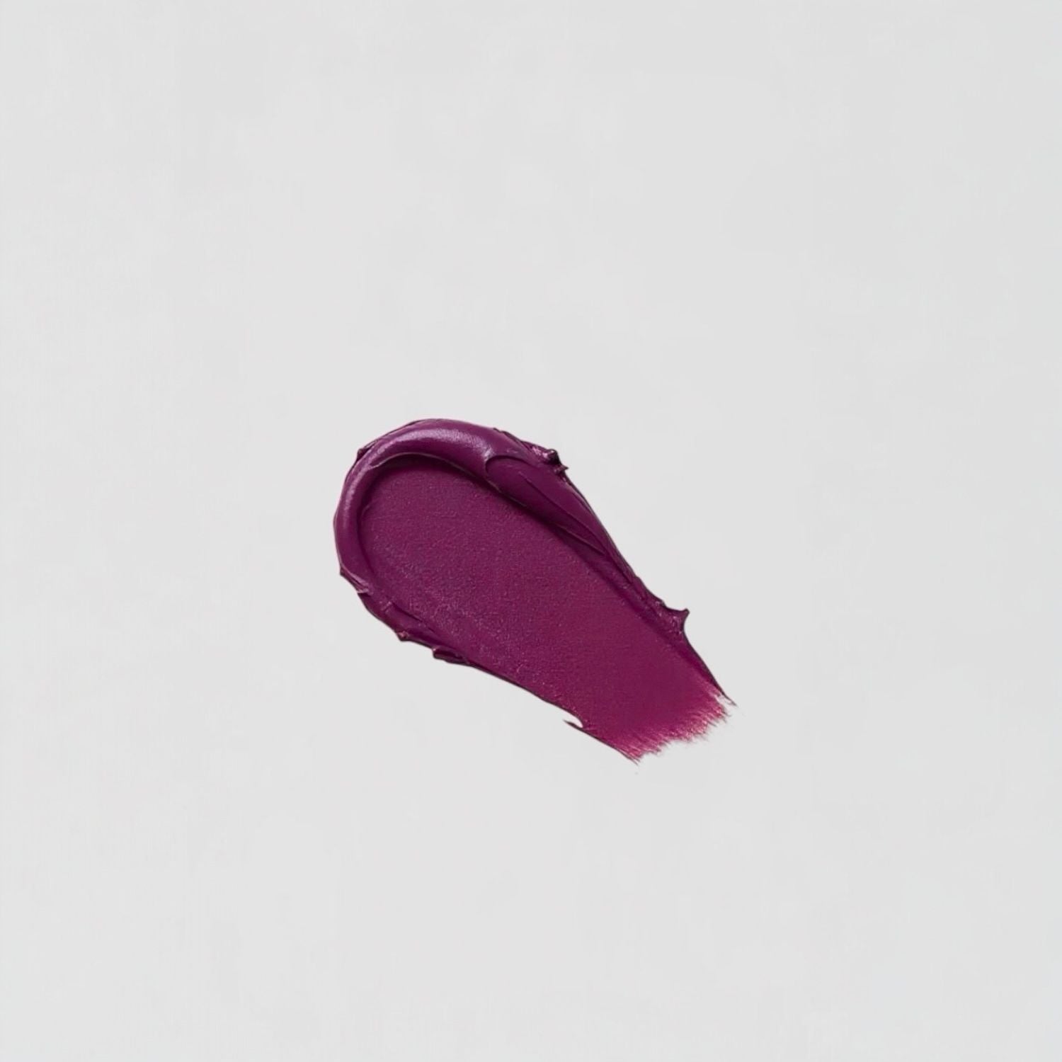 Purple Lip Stain swatch showcasing velvety matte finish and rich color.