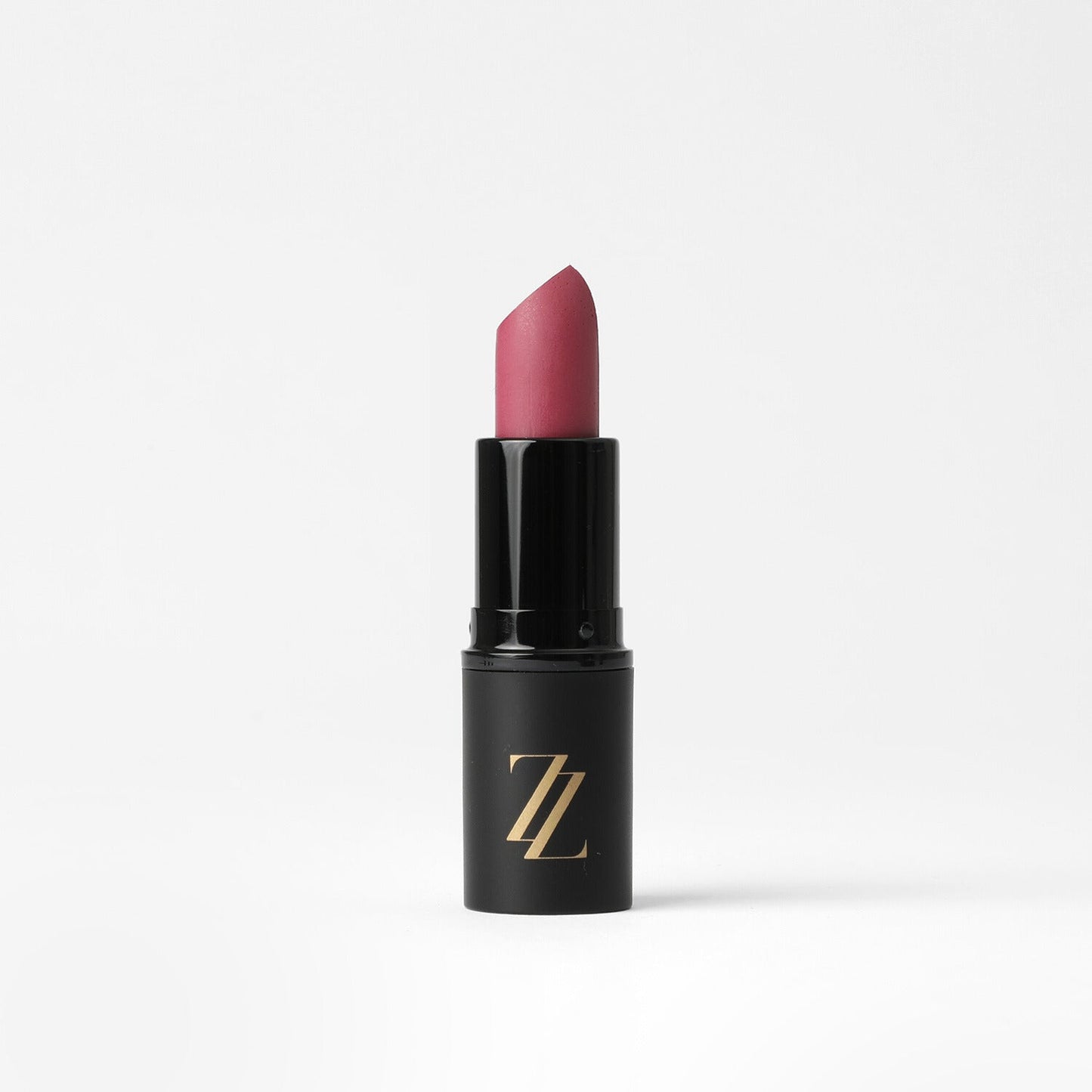 Satin Lipstick in elegant black case with a creamy full-coverage formula, providing a satin sheen for lasting moisture and comfort.