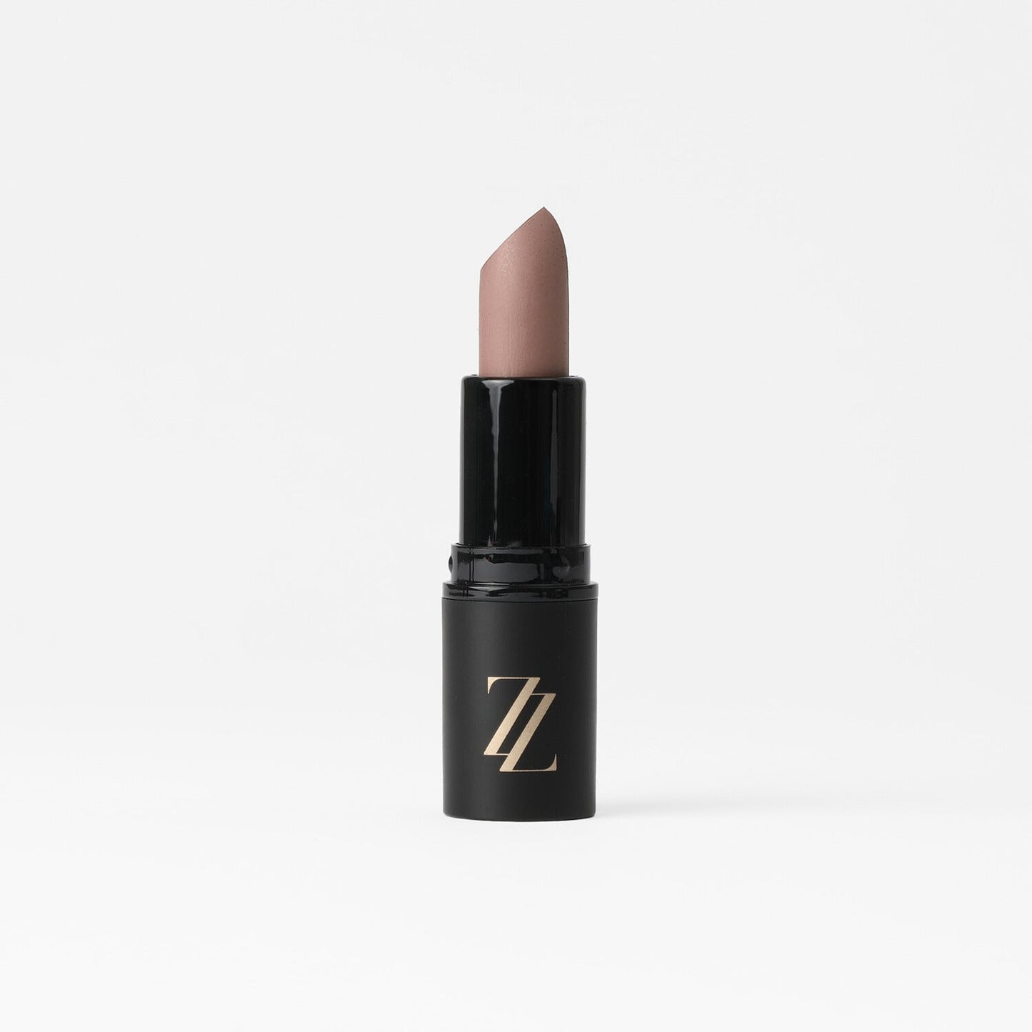 Satin Lipstick in sleek black tube with creamy vegan full-coverage formula and satin sheen, perfect for moisturizing and lasting wear.