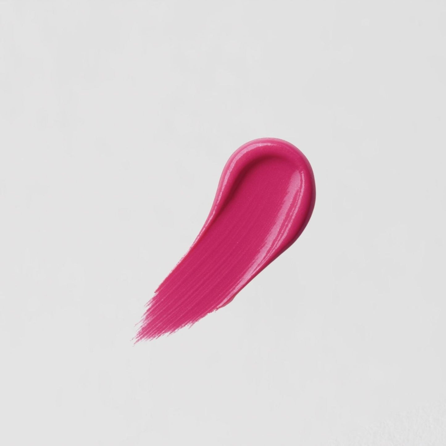 Satin Lipstick swatch showcasing vibrant, creamy color with a satin sheen, highlighting its full-coverage and vegan formula.