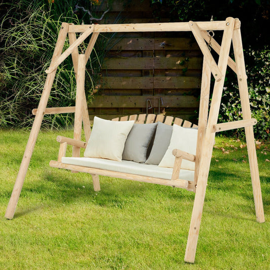 Outdoor Wooden Porch Bench Swing Chair with Rustic Curved Back on green lawn, featuring a sturdy fir wood frame and comfortable seating.