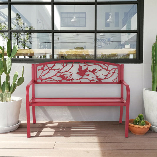 Red Patio Garden Bench Park Yard Outdoor Furniture with cast iron backrest, surrounded by potted plants on a wooden deck.