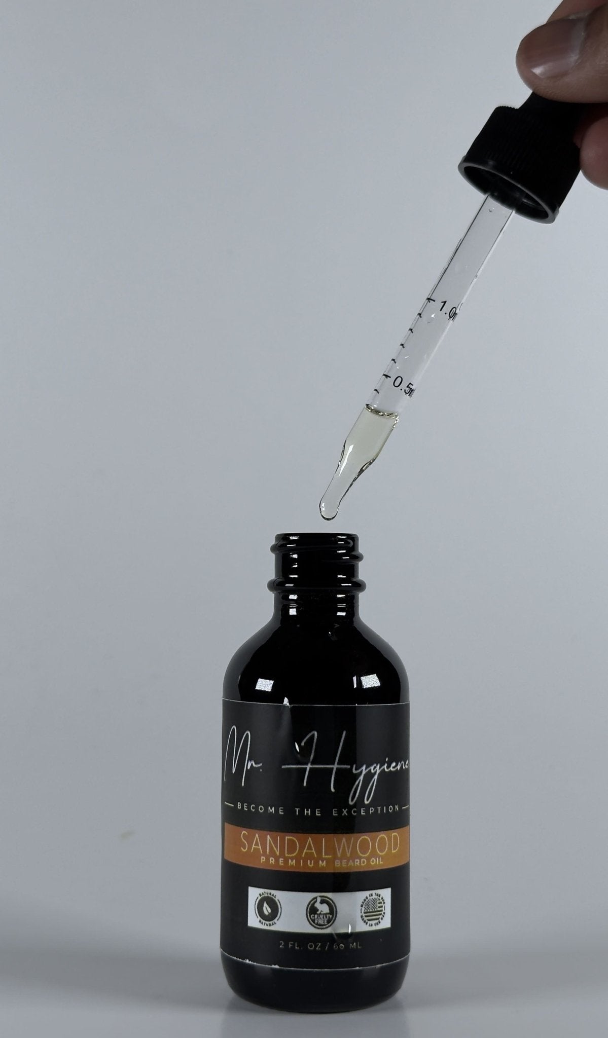 Sandalwood Beard Oil for Men – Smooth, Bold & Clean in a bottle with a dropper, ideal for hydrating and nourishing facial hair.