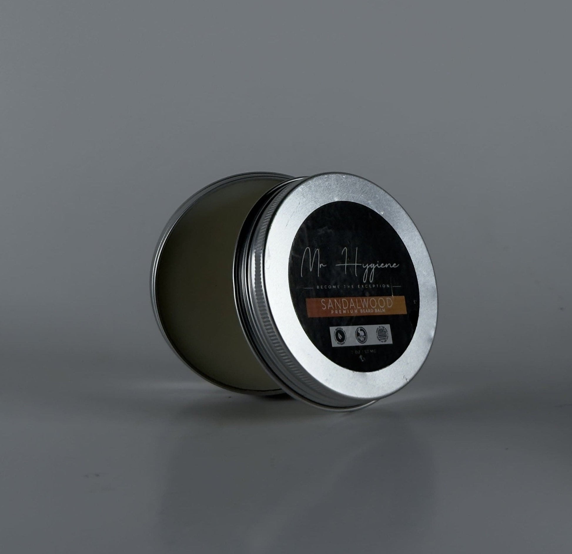 Sandalwood Beard Balm for Men – Shape, Soften & Scent in a tin container, ideal for styling and nourishing beards.
