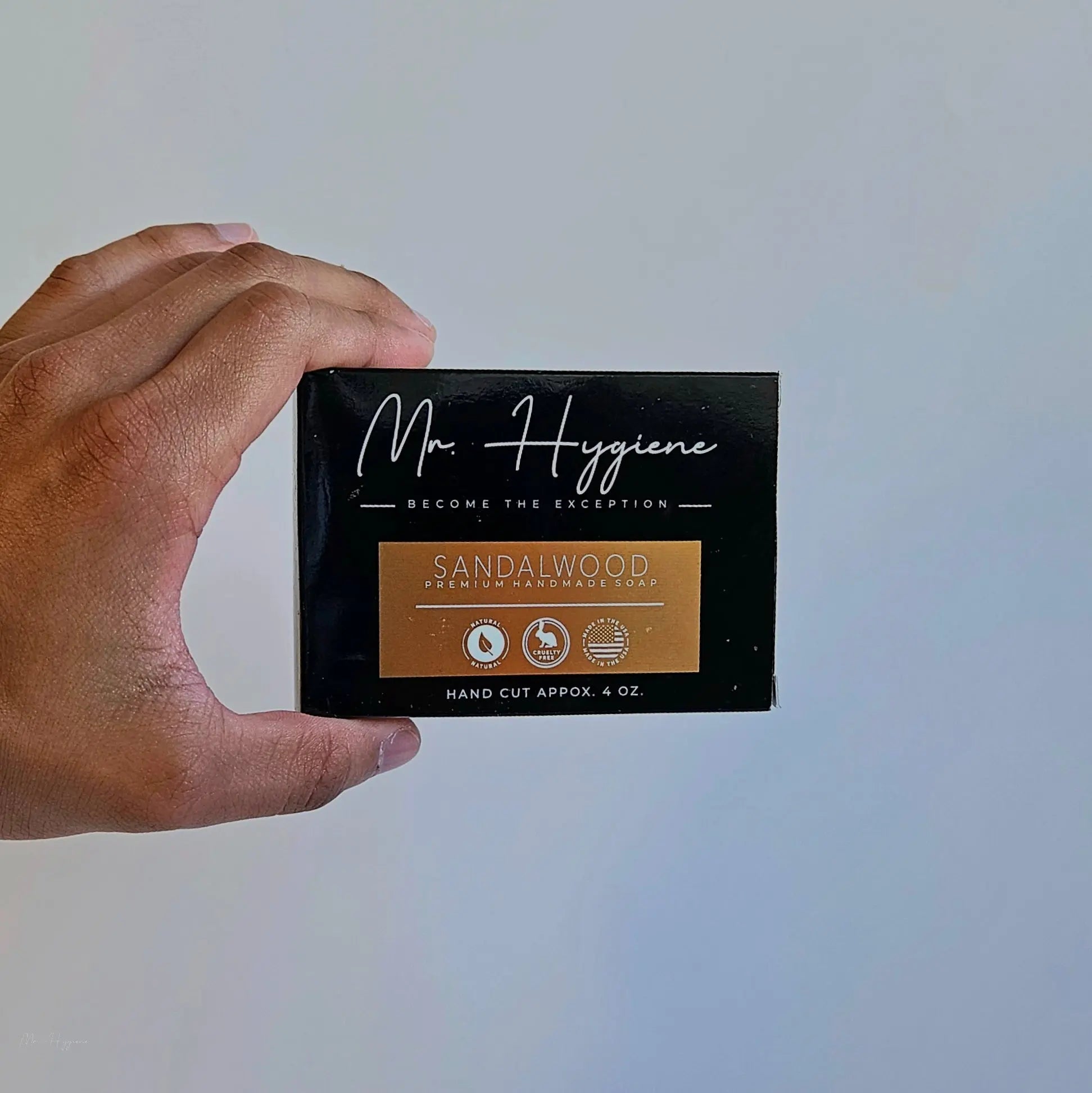 Man holding Sandalwood Bar Soap – Classic Scent, Deep Clean for effective and eco-friendly grooming.