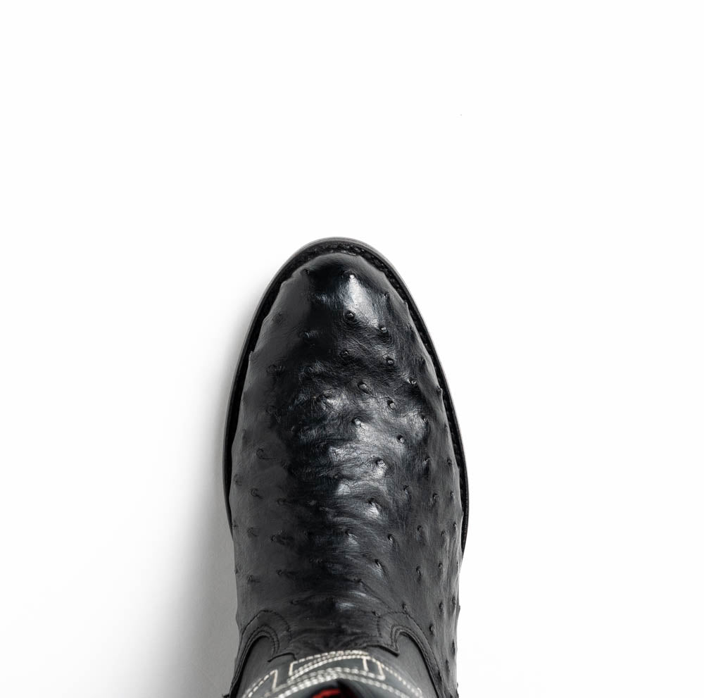Savannah Black genuine ostrich skin cowboy boot close-up from Western Collection, featuring round toe and bold design.