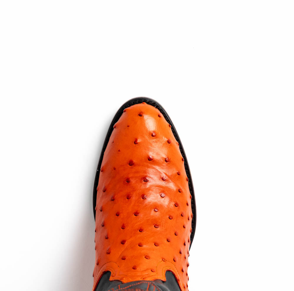 Close-up of Savannah Orange ostrich skin cowboy boot from the Western Collection, featuring bold design and craftsmanship.
