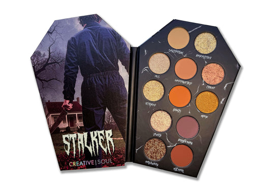 Stalker Eyeshadow Palette in coffin-shaped packaging with 12 neutral shades for Halloween-inspired makeup looks.
