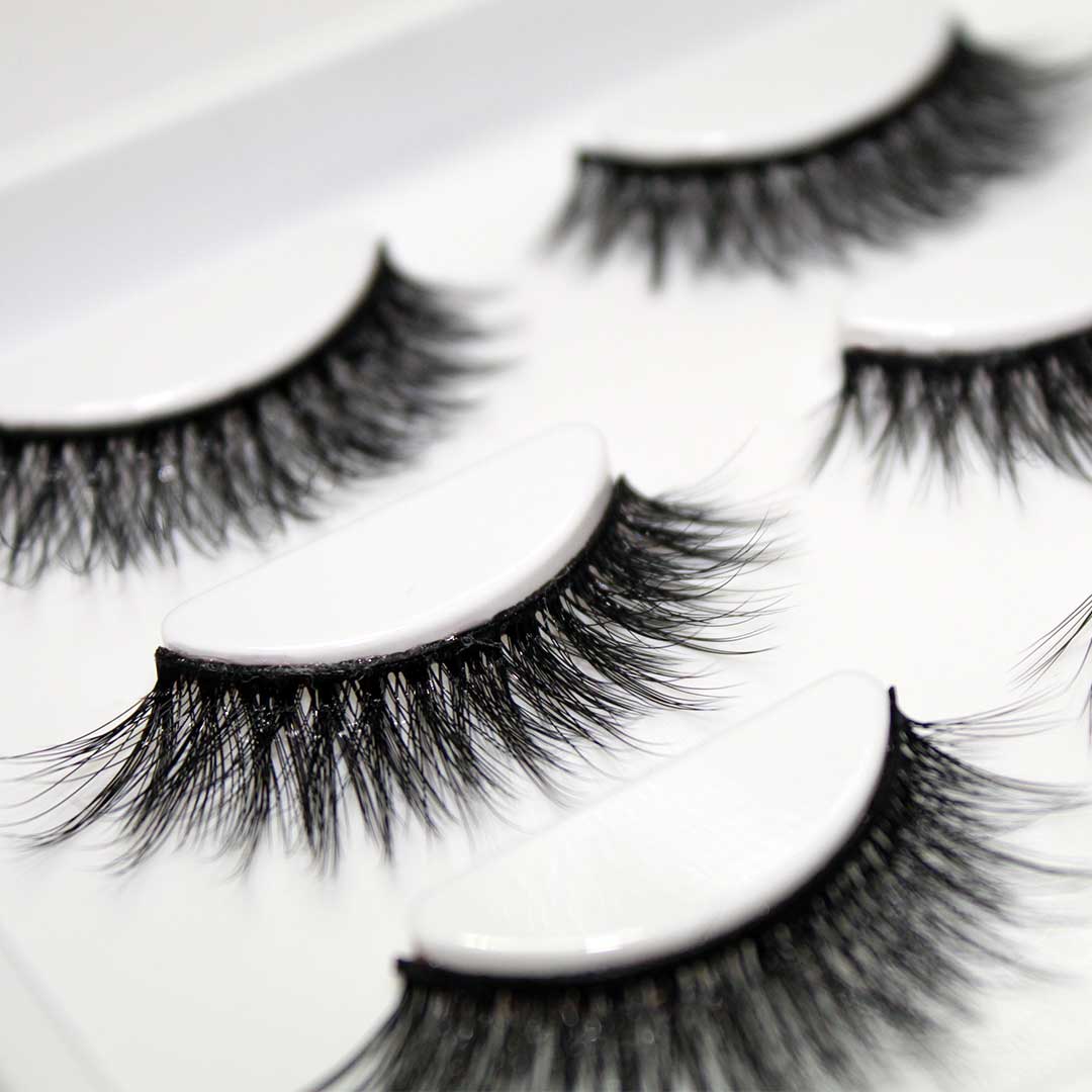 The Threesome | 3 Way Strip Lash Set featuring three dramatic reusable false eyelash styles for bold makeup looks.