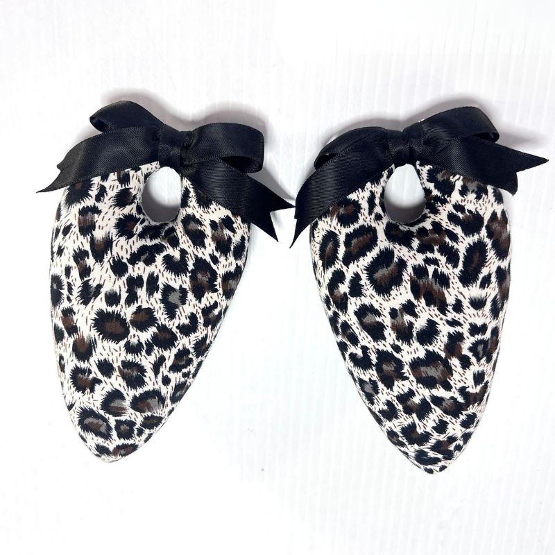 Leopard print handmade Golf Shoe Stuffers with black bows for stylish shoe shaping and protection.