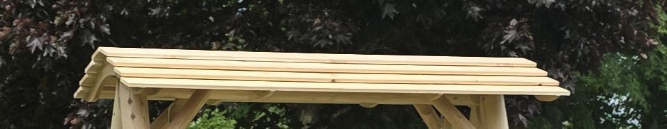 Swing Canopy for HD Swing made of wood shown in a garden setting, part of the easy-to-assemble canopy kit for enhanced relaxation.