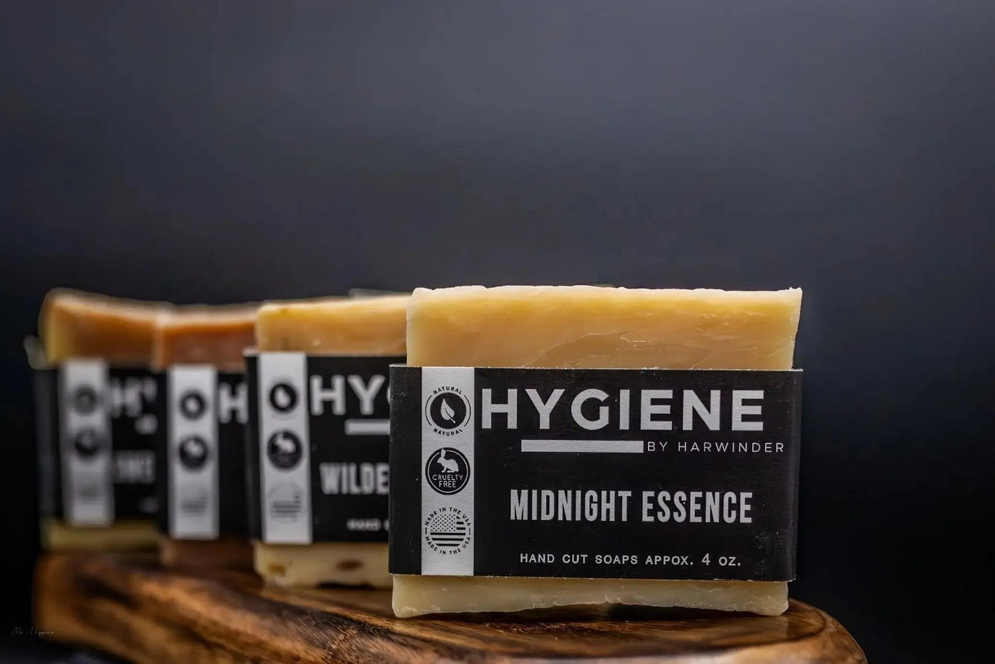 Premium Natural Bar Soap Collection for Men featuring Midnight Essence soap bars displayed on a wooden tray.
