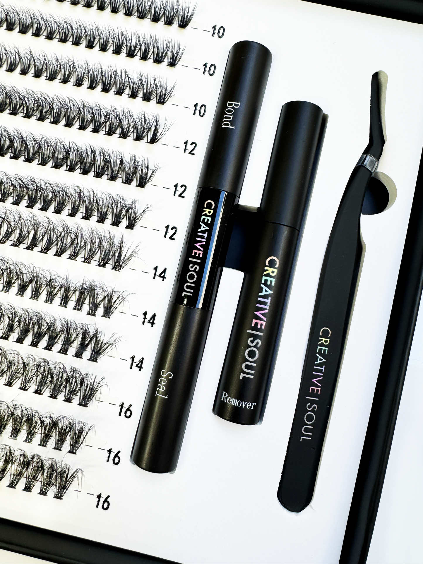 Illusion DIY Eyelash Extension Kit with faux mink eyelash clusters and application tools for professional-looking lashes at home.