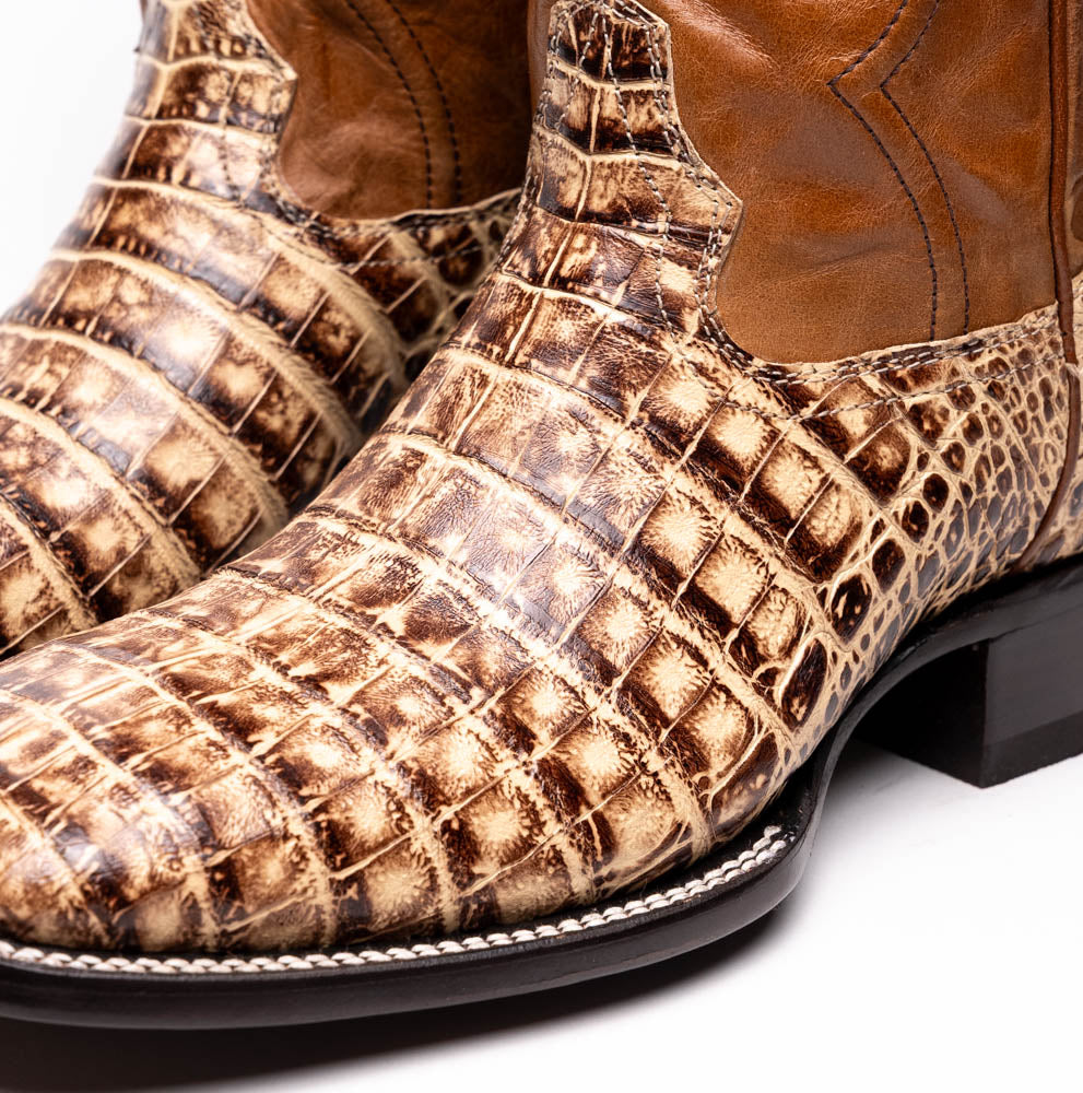 Tucson Stone Orix cowboy boot made from genuine caiman belly skin and leather, showcasing Western style and craftsmanship in square-toe design.